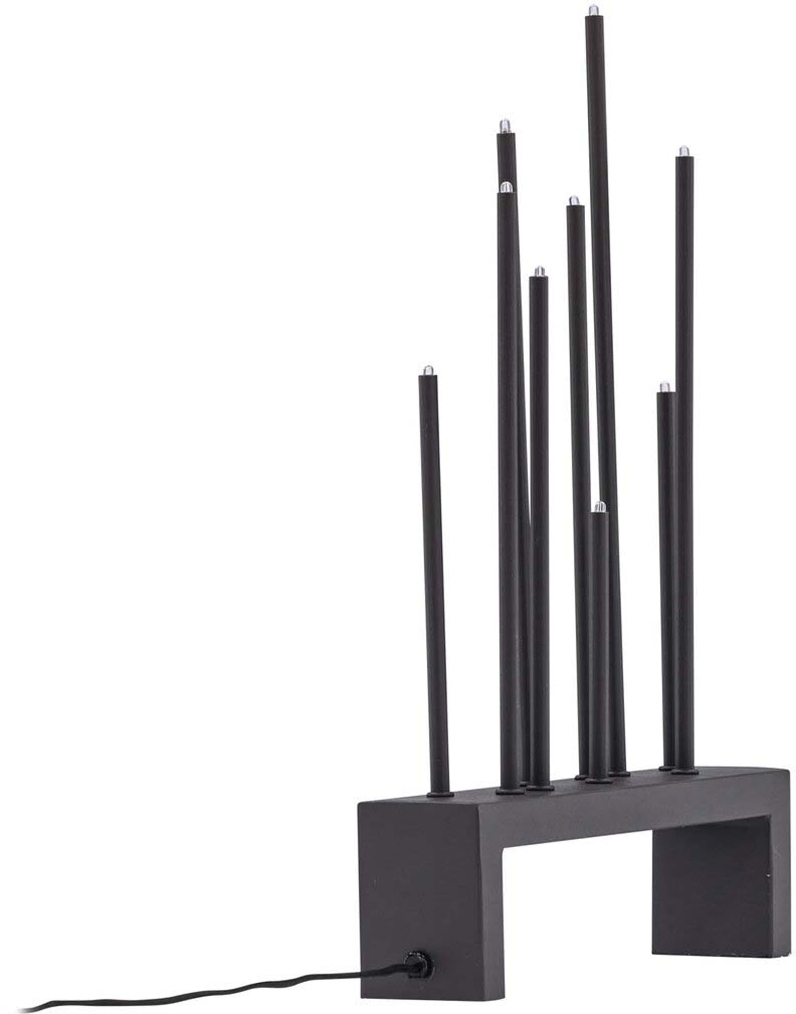 Vallåsen Tischlampe: Stilvolle Tischlampe aus hochwertigem Stahl, die mit ihrem warmen Licht und modernem Design eine einladende Atmosphäre schafft.