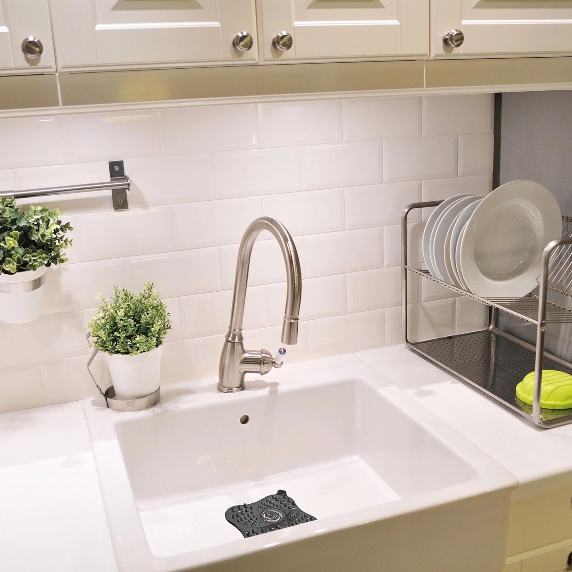 Praktisches 2-teiliges Abfluss-Sieb-Set von Westmark, ideal für Küche und Bad, verhindert Verstopfungen effektiv.