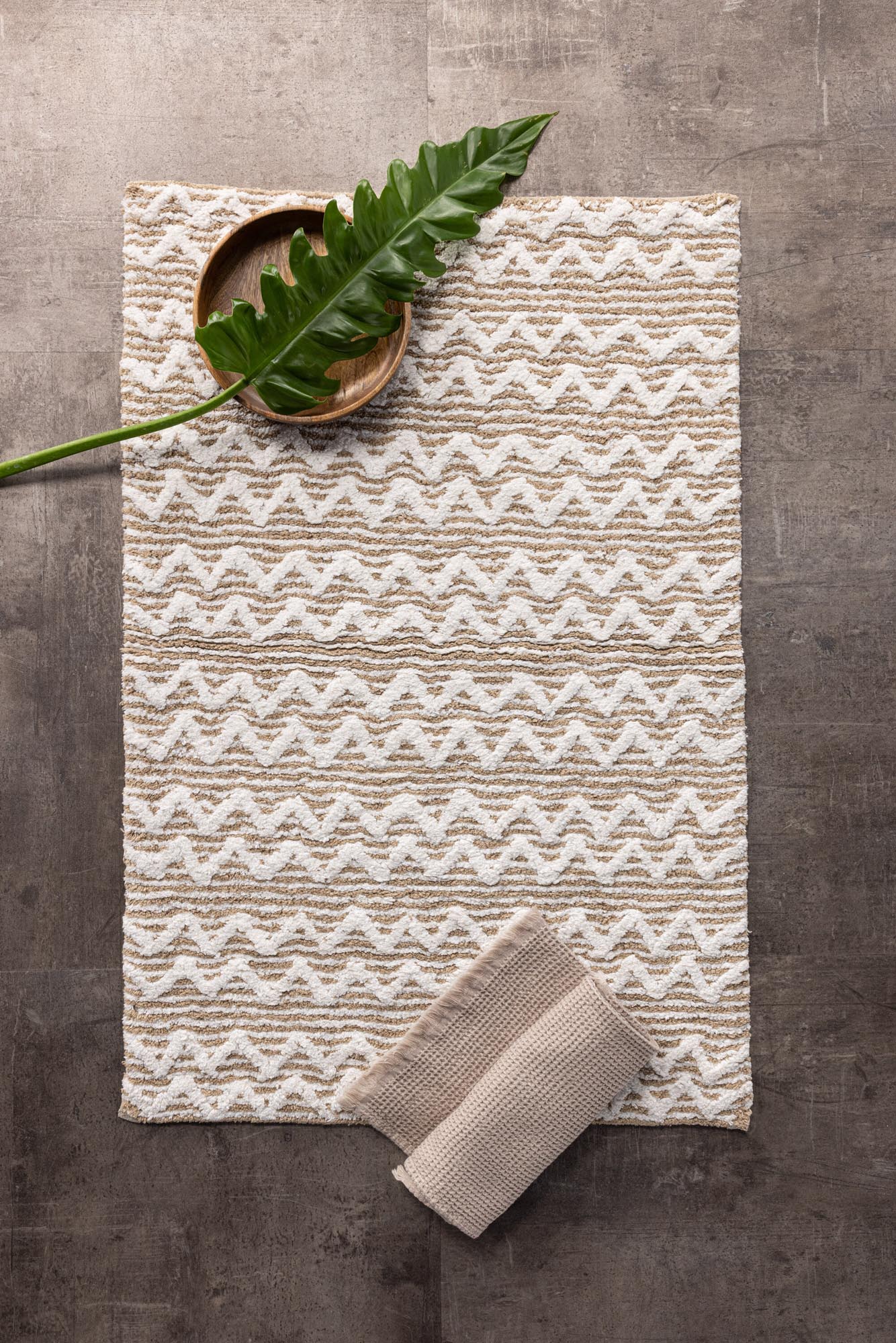 Entdecken Sie den Philippa Teppich von Venture Home: Hochwertige Baumwolle, 60x90 cm, ideal für jedes Badezimmer. Stilvoll, saugfähig und pflegeleicht.