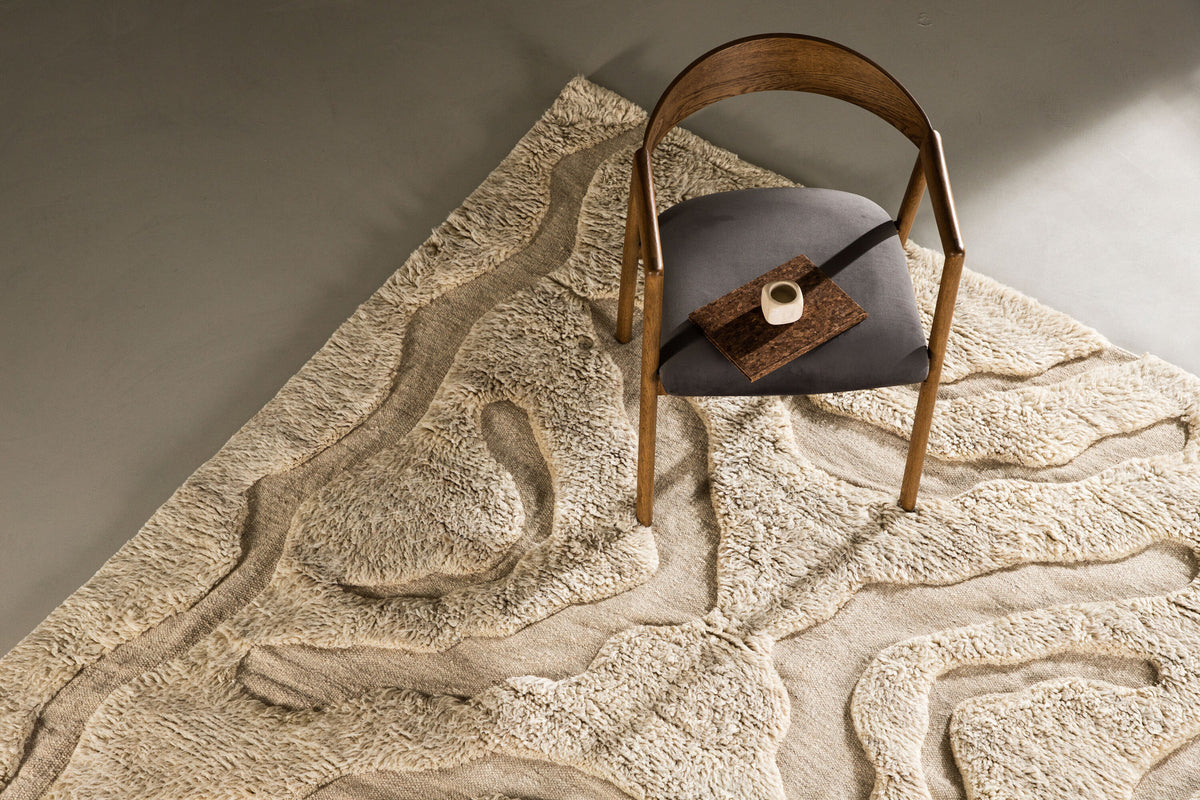 Trondheim x Josefin Lustig Teppich in Beige präsentiert im Onlineshop von KAQTU Design AG. Teppich ist von Vind