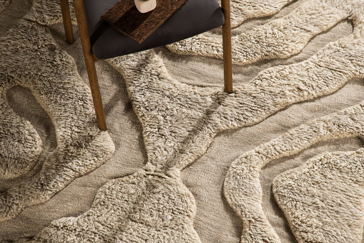 Trondheim x Josefin Lustig Teppich in Beige präsentiert im Onlineshop von KAQTU Design AG. Teppich ist von Vind