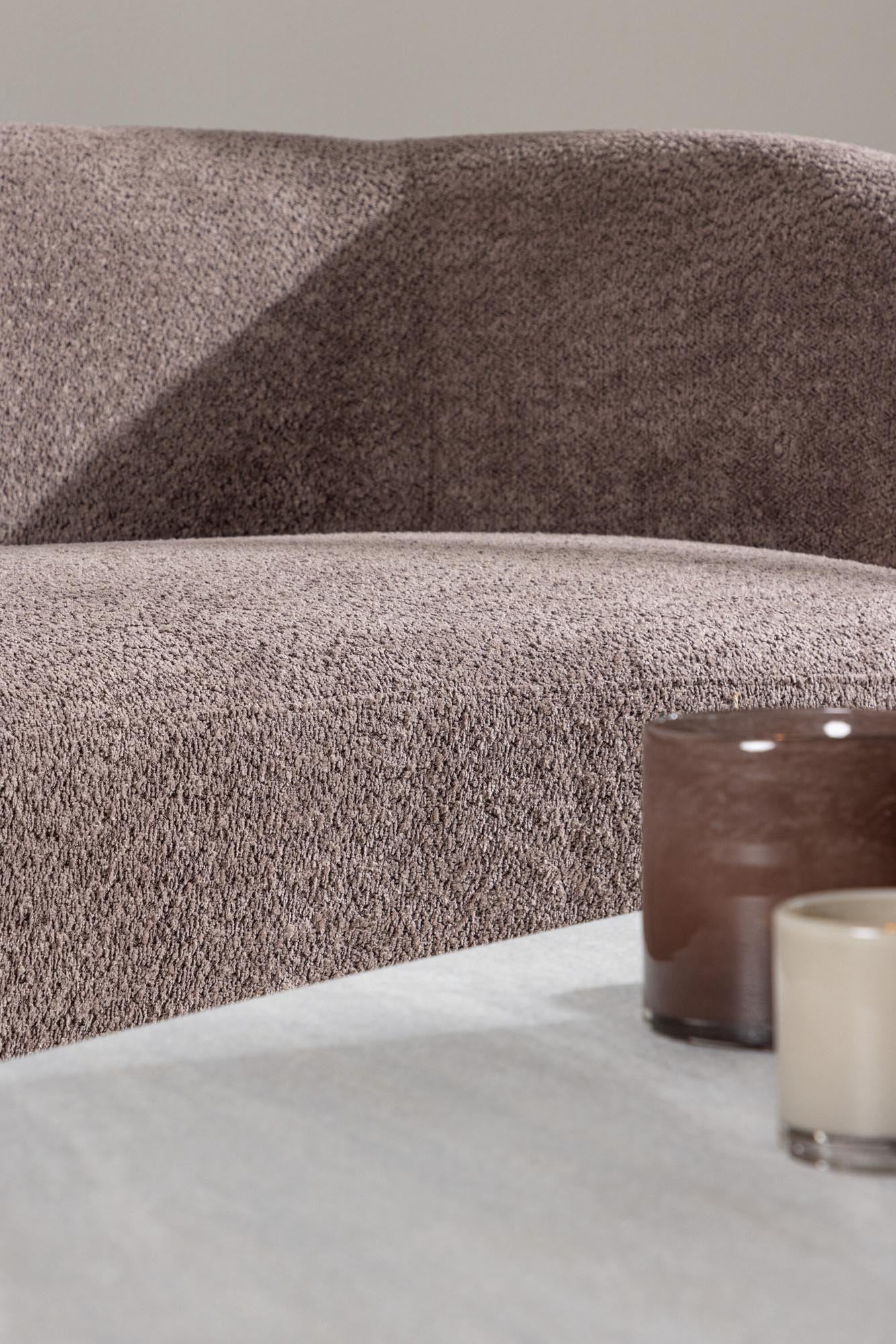 Cielo Sofa: Eleganz und Komfort vereint in organischer Form für stilvolle Entspannung.