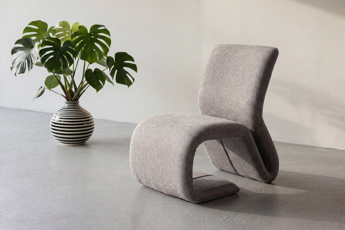 Rulls Sessel in Braun präsentiert im Onlineshop von KAQTU Design AG. Sessel mit Armlehnen ist von Venture Home