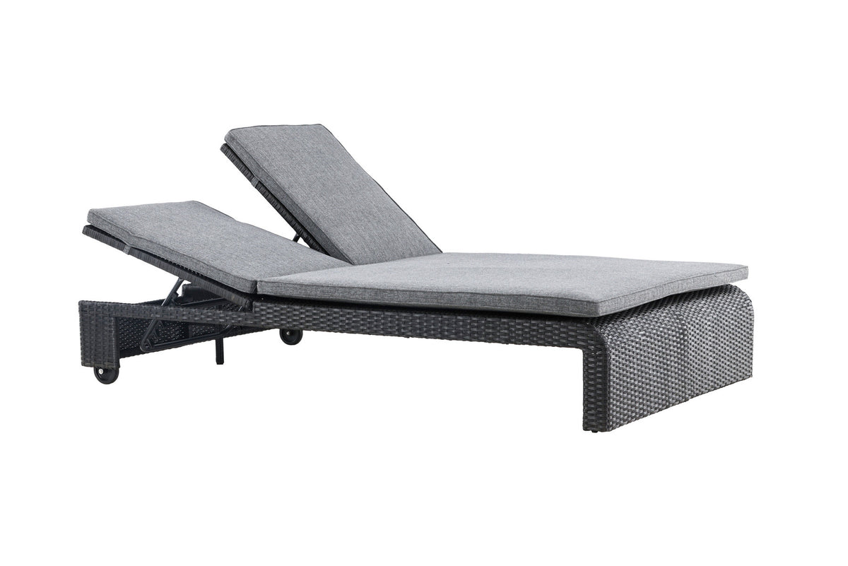 Sonnenliege London von Venture Home in Schwarz mit grauem Kissen und Korbgeflecht