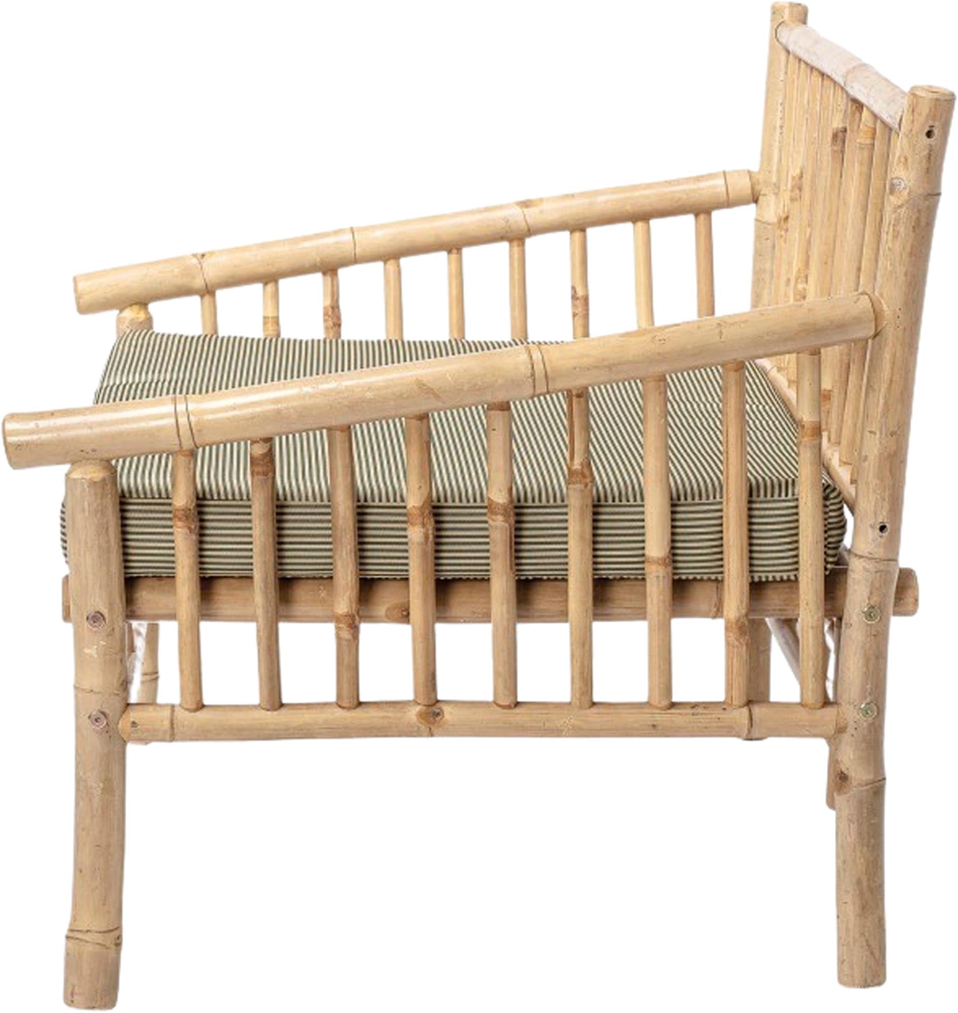 Eleganter Bambus-Loungesessel für stilvolle Entspannung im Freien, mit wetterfestem Polster für maximalen Komfort.