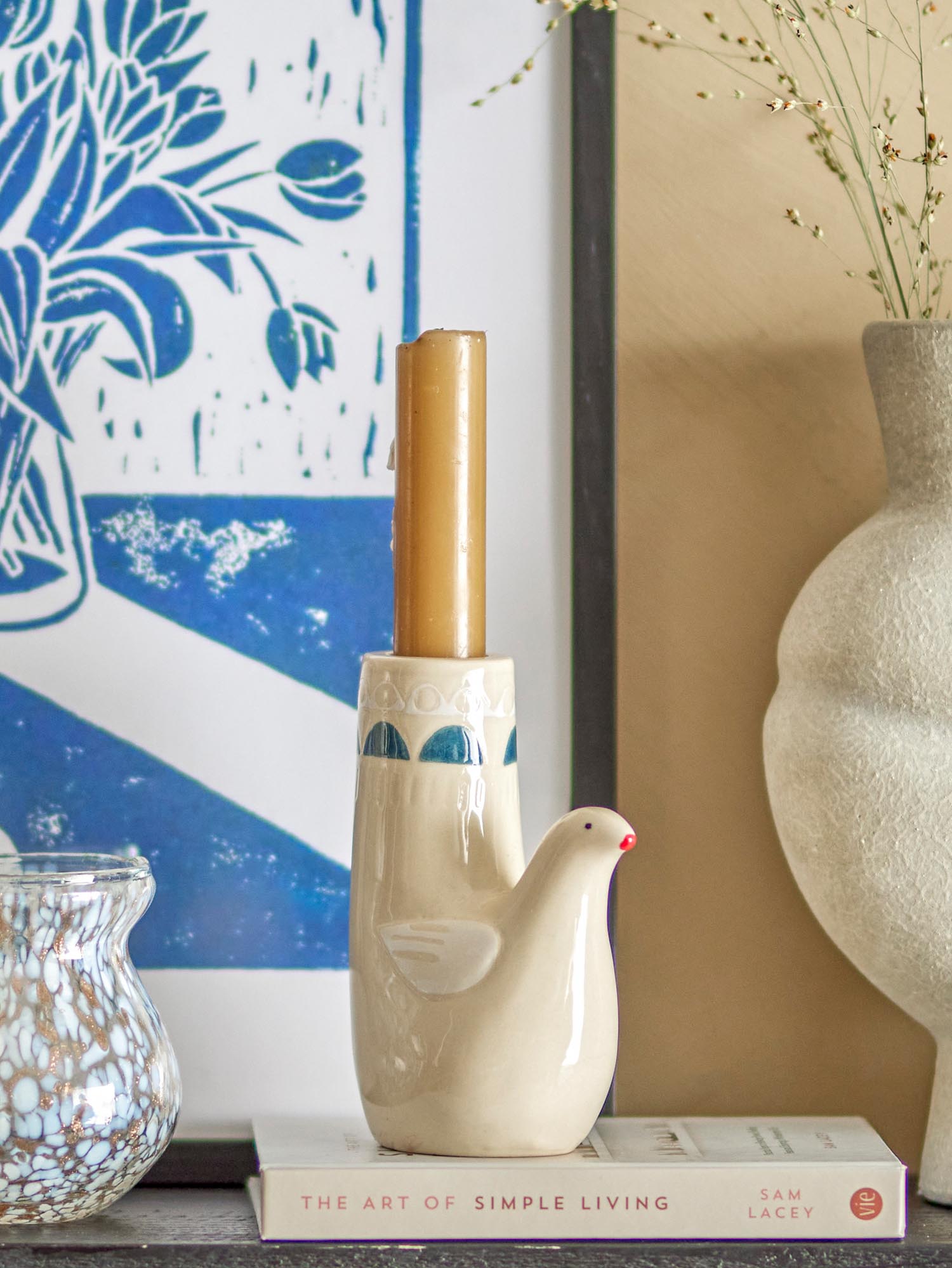 Eleganter Kerzenhalter aus weissem Steingut, in Vogel-Form, handbemalt, für stimmungsvolle Akzente im Wohnraum.