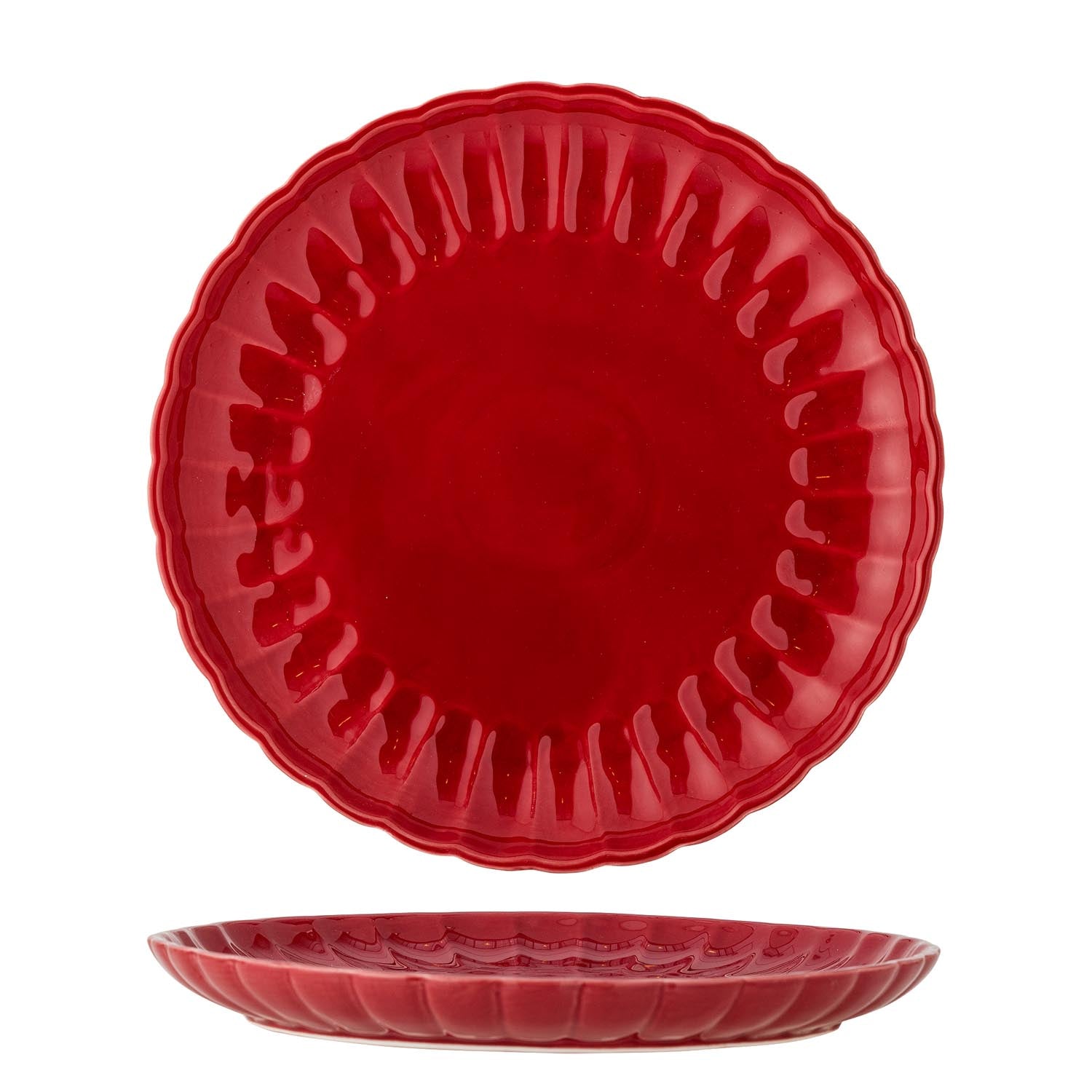 Der rote Latina Teller von Bloomingville aus Steingut überzeugt mit stilvollem Design und ist ideal für eine elegante Tischdekoration.