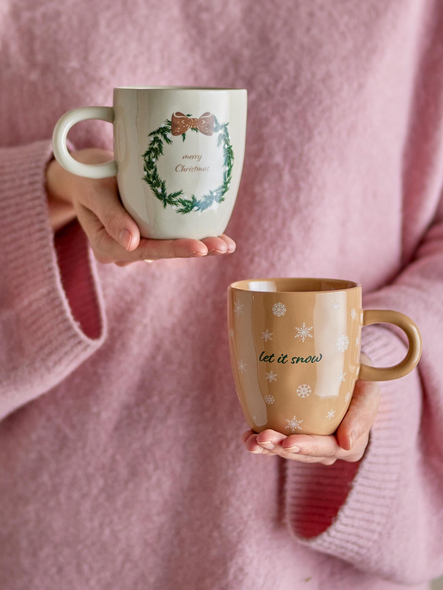 Elegante Steingutbecher von Bloomingville: robust, pflegeleicht, mit zeitloser Ästhetik und liebevollen Motiven.