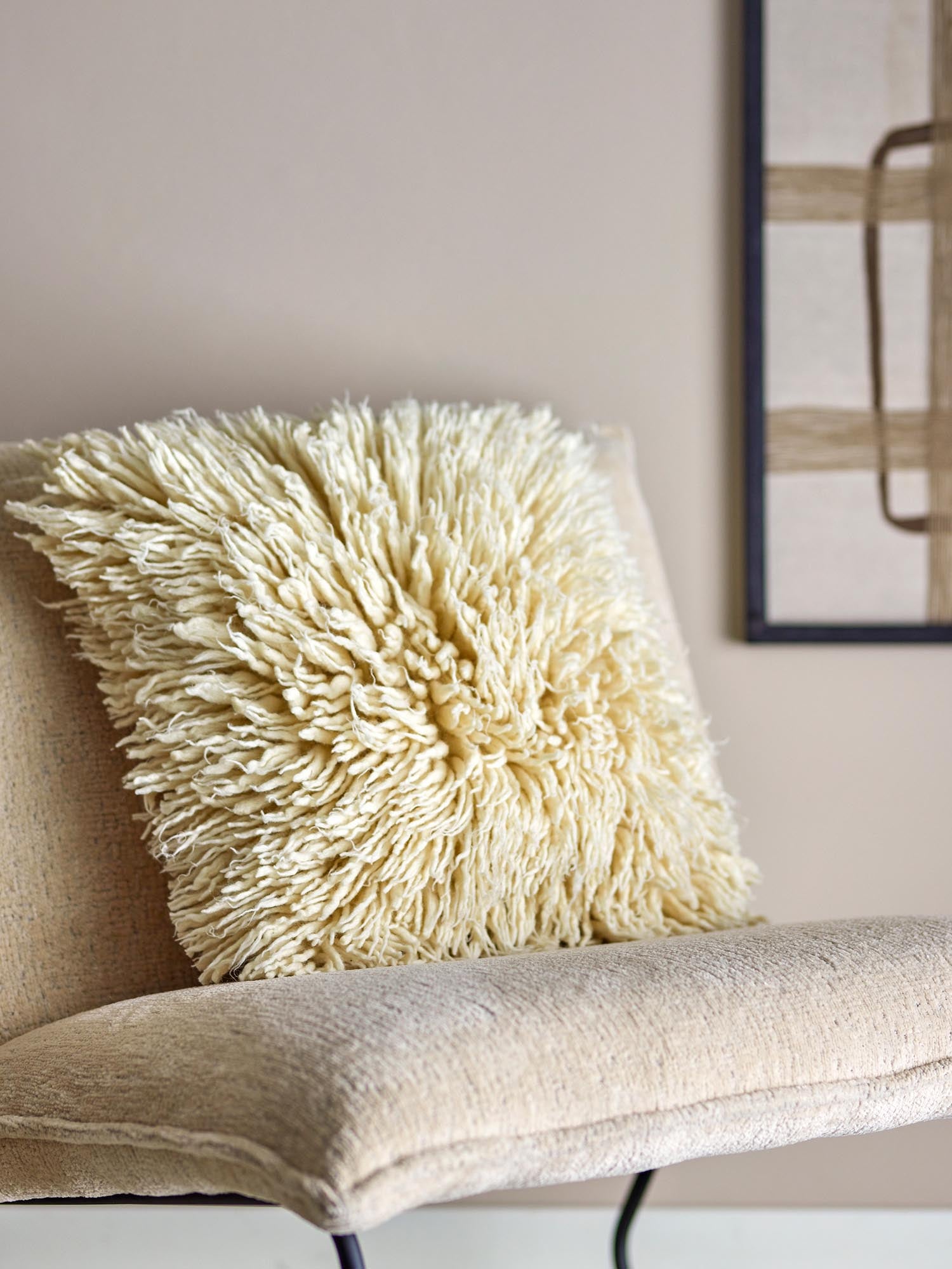 Ein stilvolles Wollkissen in Sternform, das Wärme und Gemütlichkeit in jeden Raum bringt.