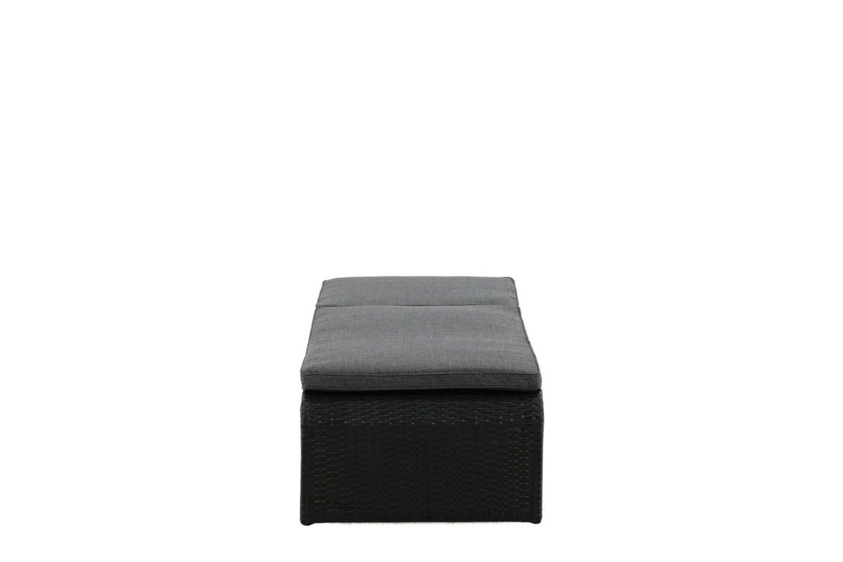 Sonnenliege London von Venture Home in Schwarz mit grauem Kissen und Korbgeflecht