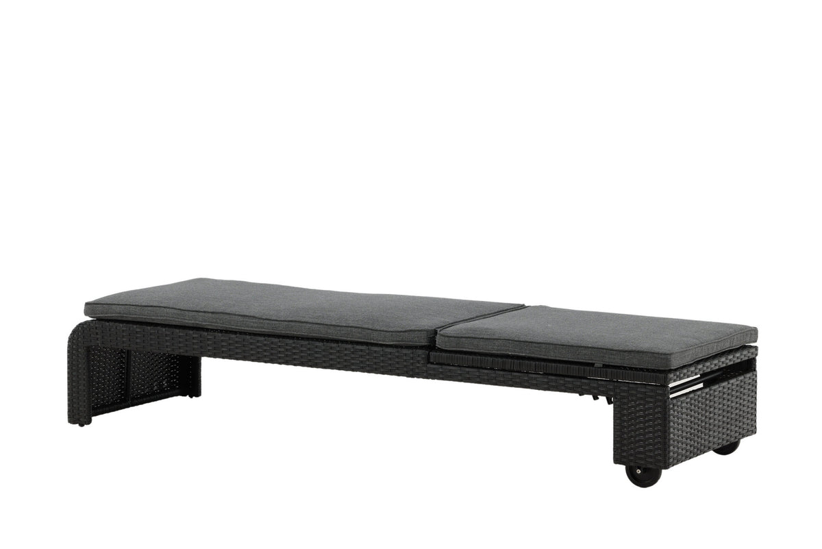 Sonnenliege London von Venture Home in Schwarz mit grauem Kissen und Korbgeflecht