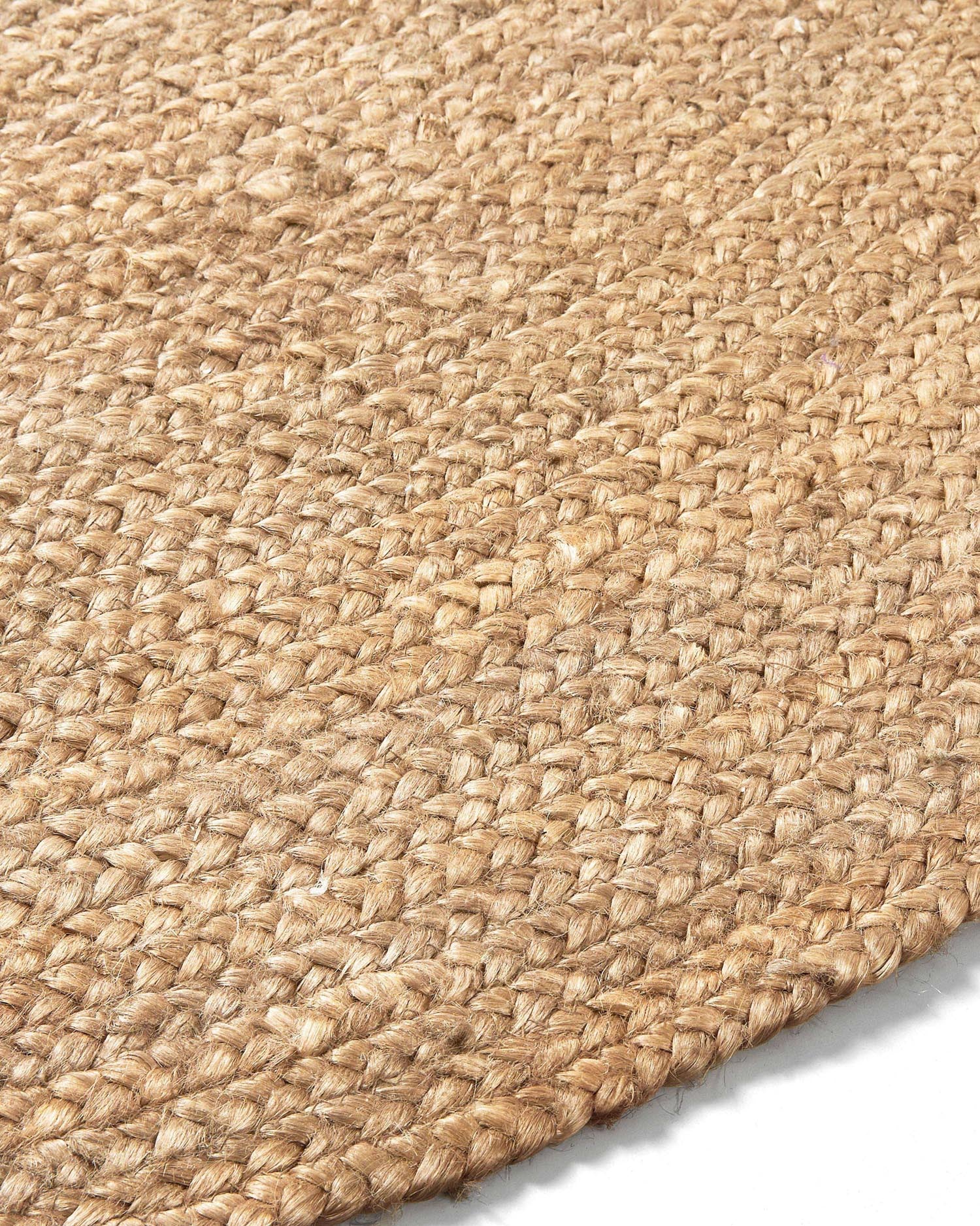 Natürlicher runder Teppich aus 100% Jute, Ø 150 cm von Kave Home. Stilvoll, nachhaltig und ideal für jeden Raum. Schaffen Sie eine einladende Atmosphäre!