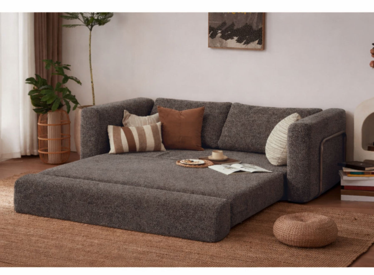 Braunes 2-Sitzer Schlafsofa Wello aus Bouclé-Stoff mit Armlehnen, Sitzhöhe 35 cm, im ausgeklappten Zustand als Bett nutzbar.