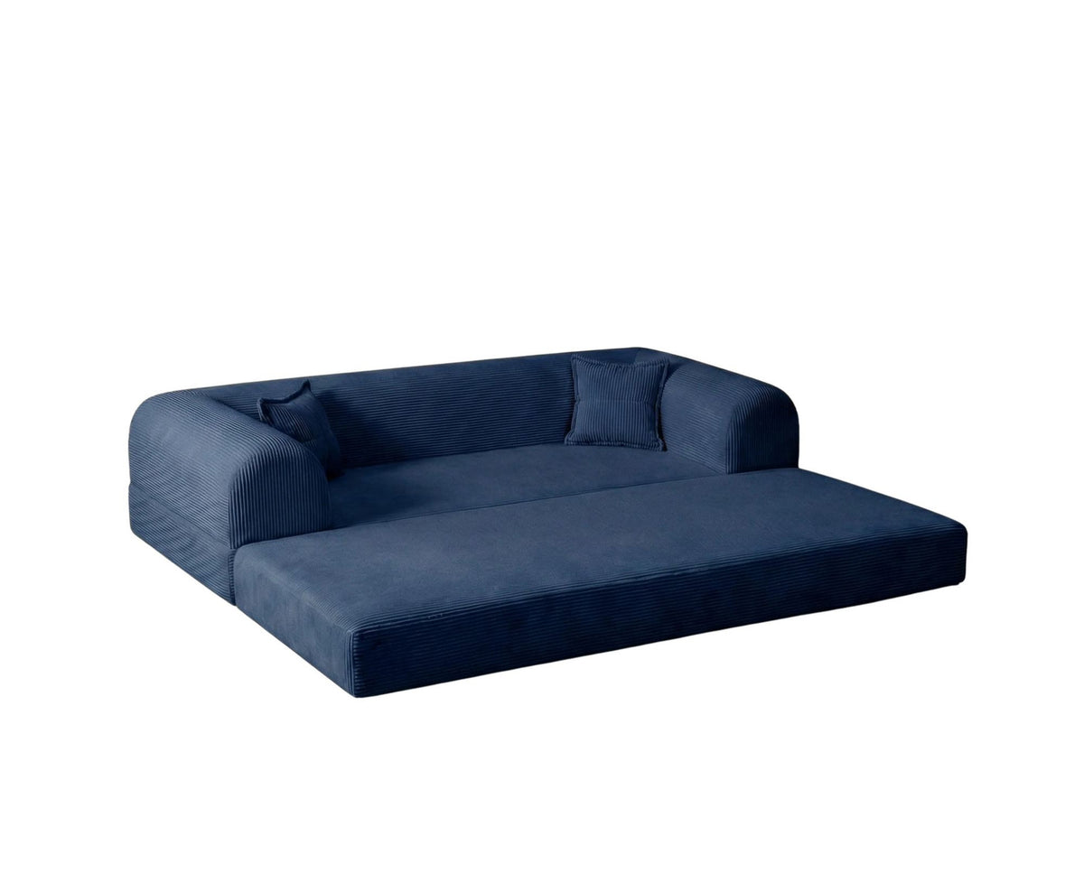 Marineblaues 3-Sitzer Schlafsofa Legom Eco von Hanah Home aus geripptem Cord-Plüschstoff mit zwei Kissen und niedrigem Rückenteil.