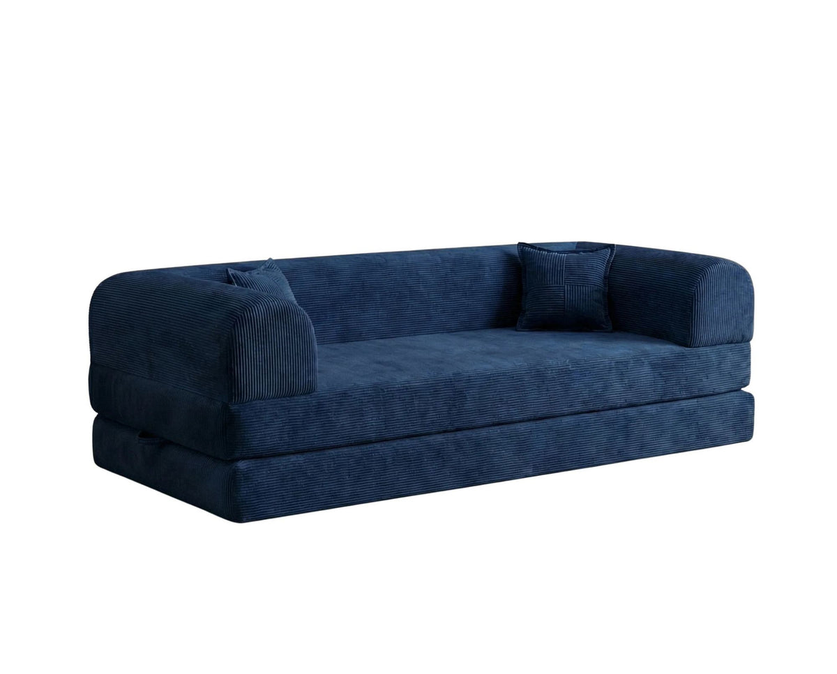 Marineblaues 3-Sitzer Schlafsofa Legom Eco von Hanah Home aus geripptem Cord-Plüschstoff mit zwei Kissen und niedrigem Rückenteil.