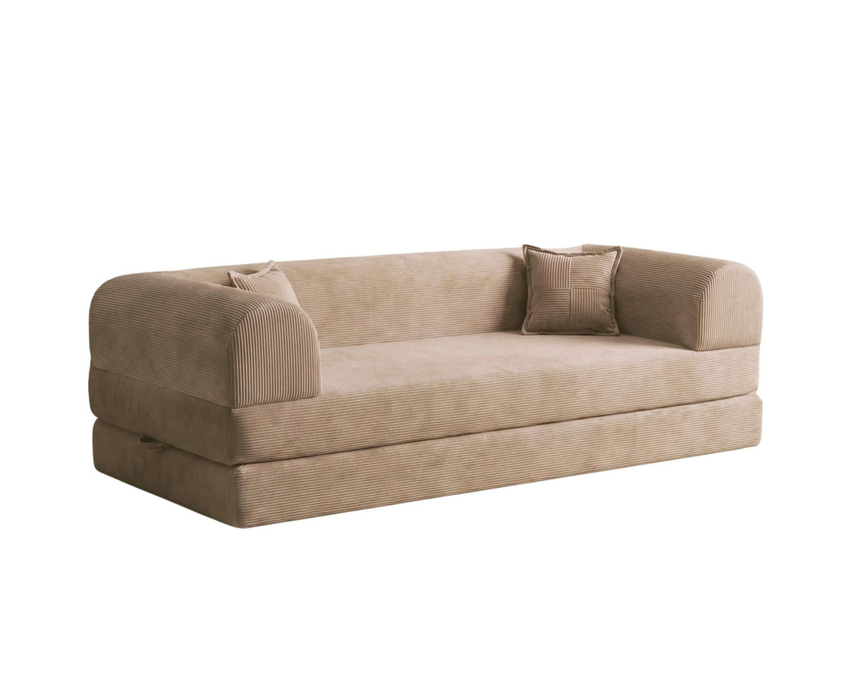 Beiges 3-Sitzer Schlafsofa aus geripptem Plüschstoff mit zwei Kissen, rutschfester Sohle und klar gerader Formgebung.