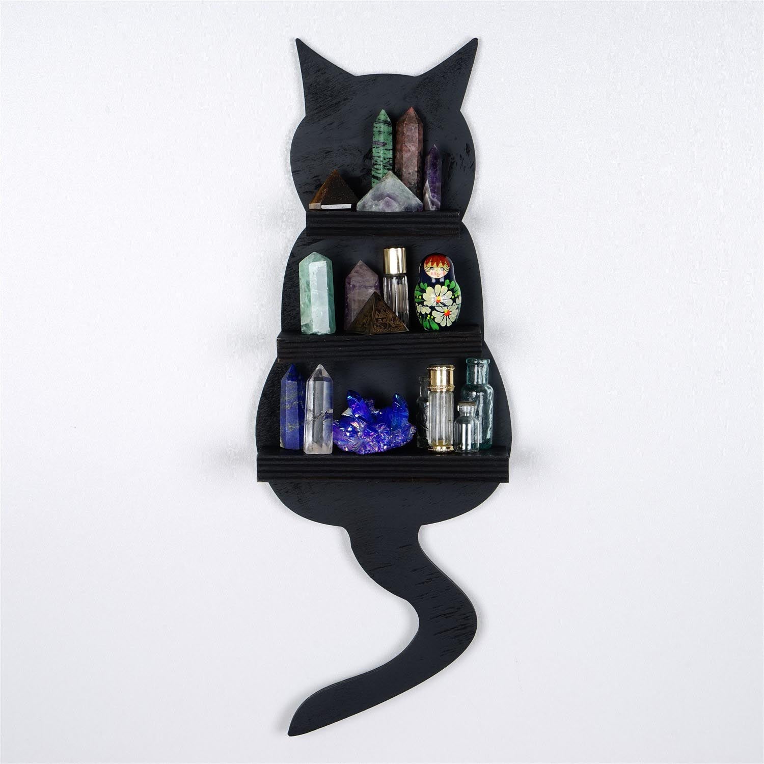 Verleihen Sie Ihrem Raum mit der MEH134 Wanddeko von Wallity in elegantem Schwarz einen Hauch von Raffinesse. Aus hochwertigem Holz gefertigt, besticht dieses kunstvolle Accessoire durch seine präzise Detailarbeit und wird zum stilvollen Mittelpunkt jeder Wand.