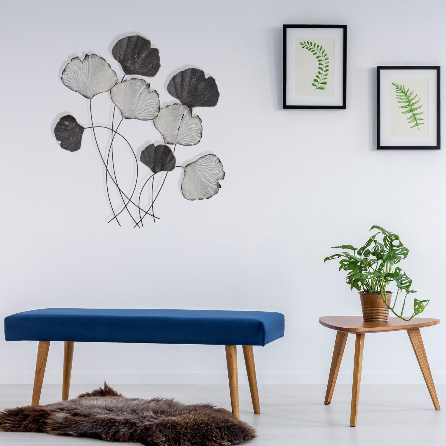 Gestalten Sie Ihre Wände neu mit der Vuzuh 2 Wanddeko von Wallity. Dieses elegante, mehrfarbige Metallstück vereint Stil und Langlebigkeit.