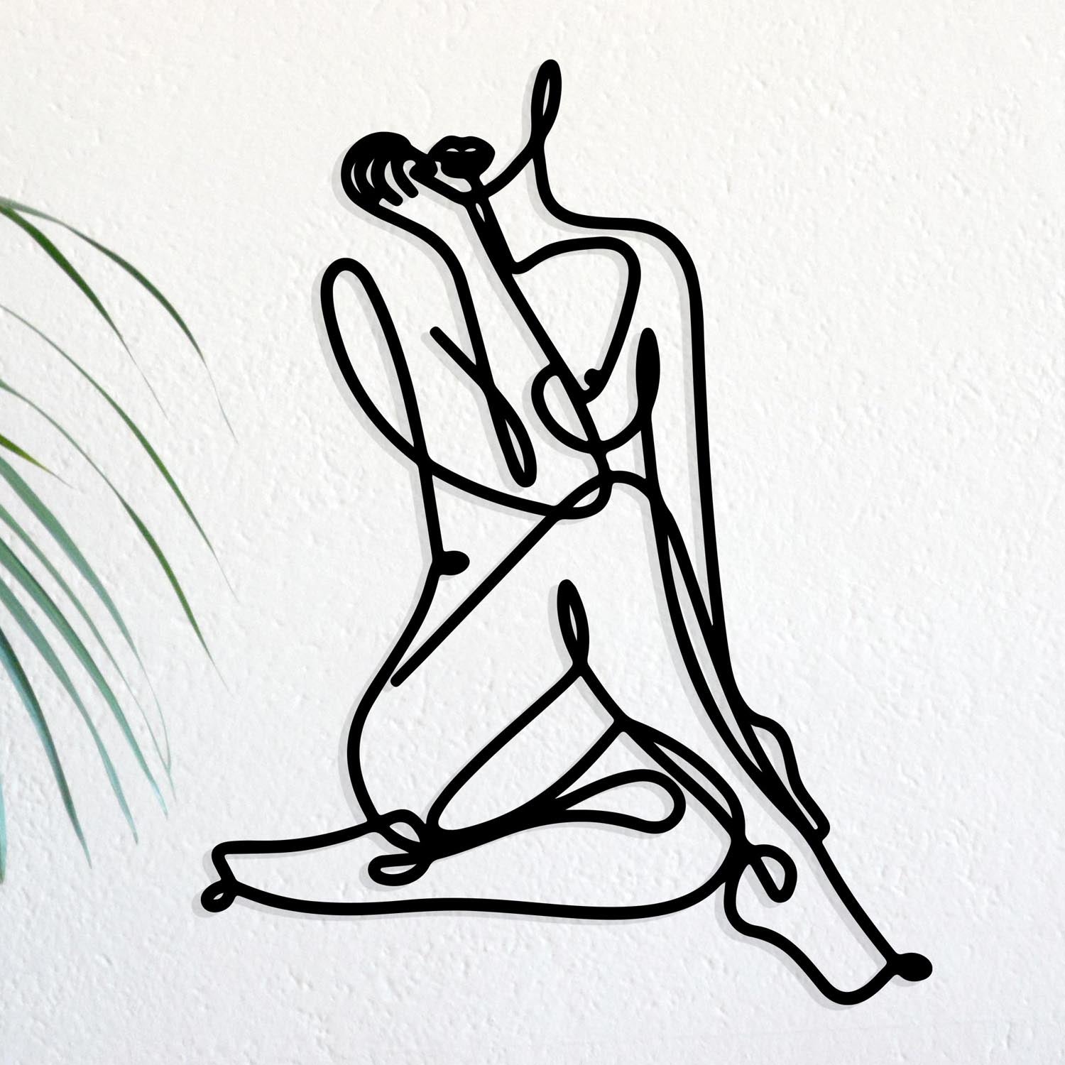 Entdecken Sie die elegante Eve Wanddeko in Schwarz von Wallity. Ein stilvolles Metall-Accessoire, das jedem Raum zeitlose Schönheit verleiht.