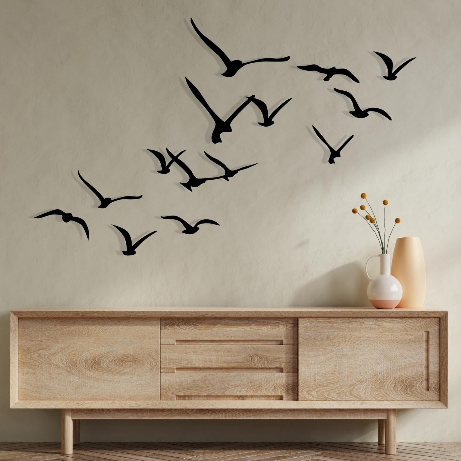 Gestalten Sie Ihre Wände neu mit der Migration Wanddeko von Wallity. 11 exquisite Vogel-Designs aus robustem Metall in elegantem Schwarz.