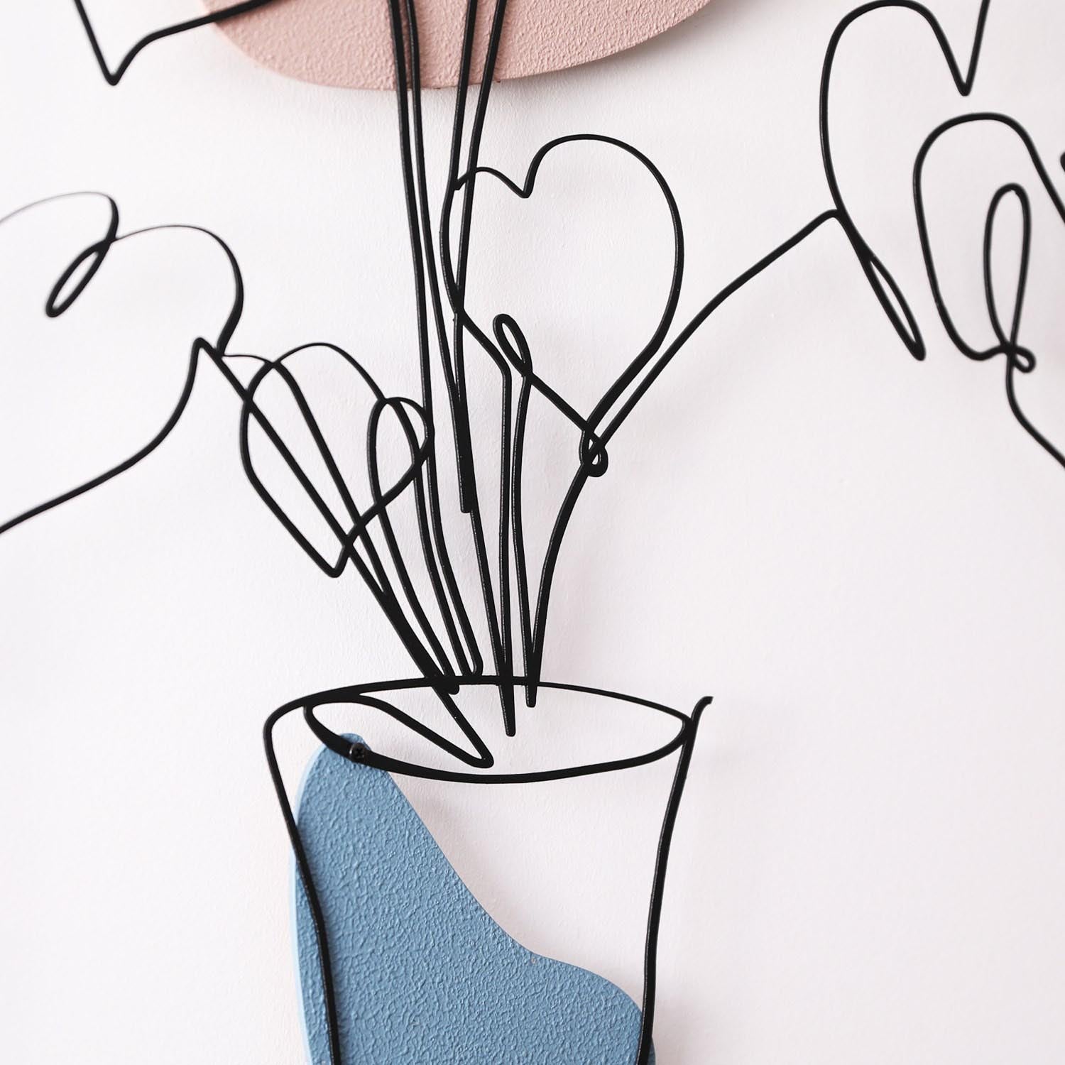 Verwandeln Sie Ihre Wände mit der mehrfarbigen Star Wanddeko von Wallity. Dieses elegante Metallstück vereint Stil und Kreativität für jeden Raum.