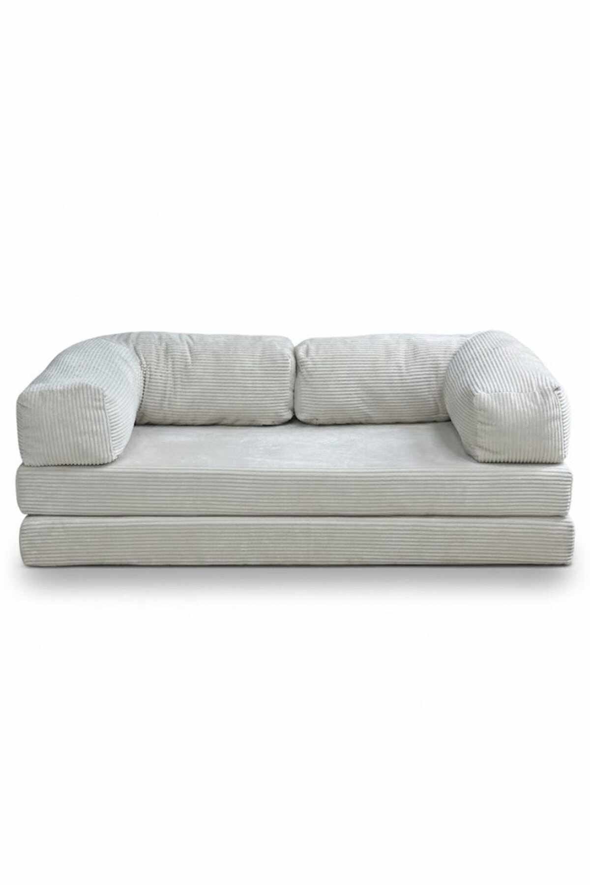 Cremefarbenes 3-Sitzer Sofa Inci von Hanah Home aus Polyester/Leinen-Stoff mit zwei Kissen und sichtbaren Eisen-Stützstreben, Frontalansicht auf hellem Hintergrund.