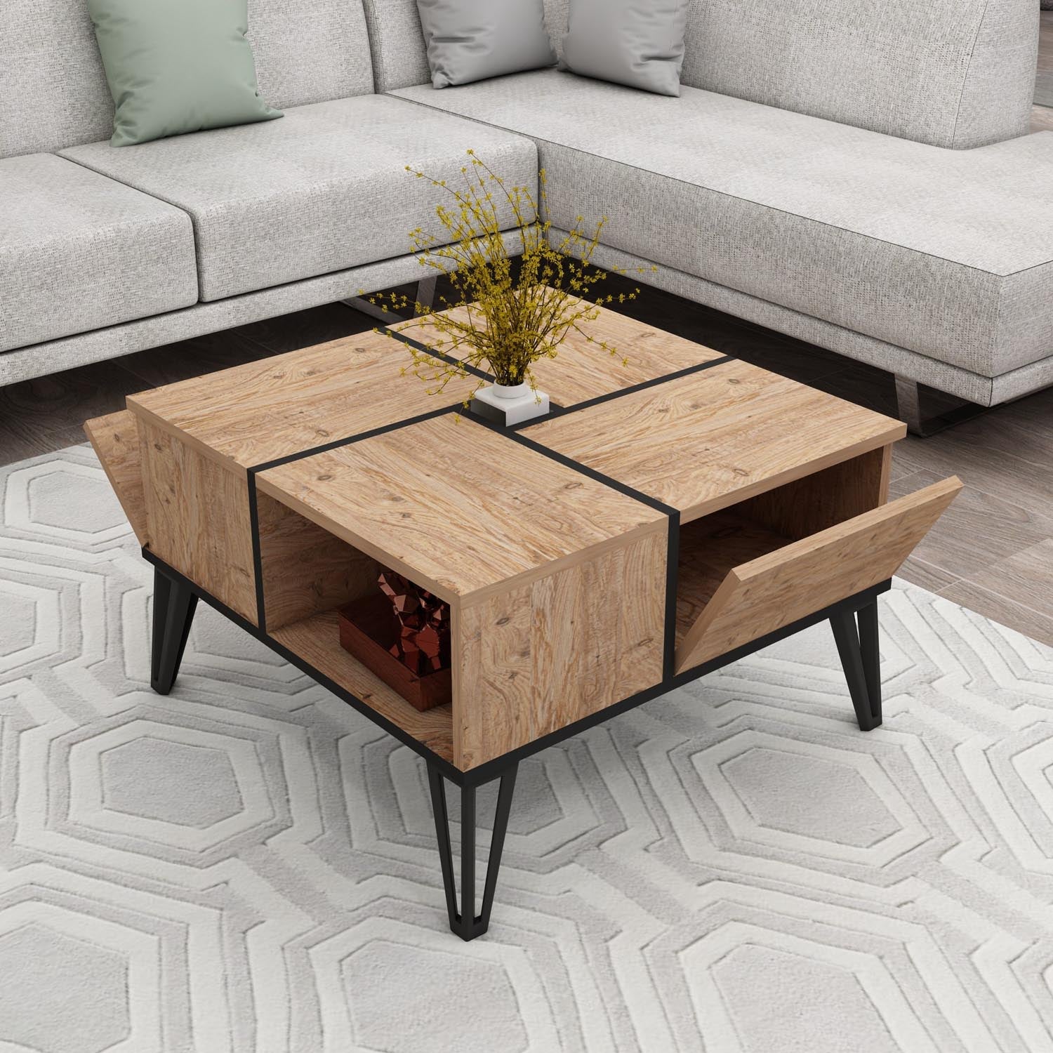 Entdecken Sie den Nirvana Sofatisch aus Atlantischer Kiefer Schwarz von Hanah Home – ein stilvolles Möbelstück, das Eleganz und praktische Funktionalität vereint.