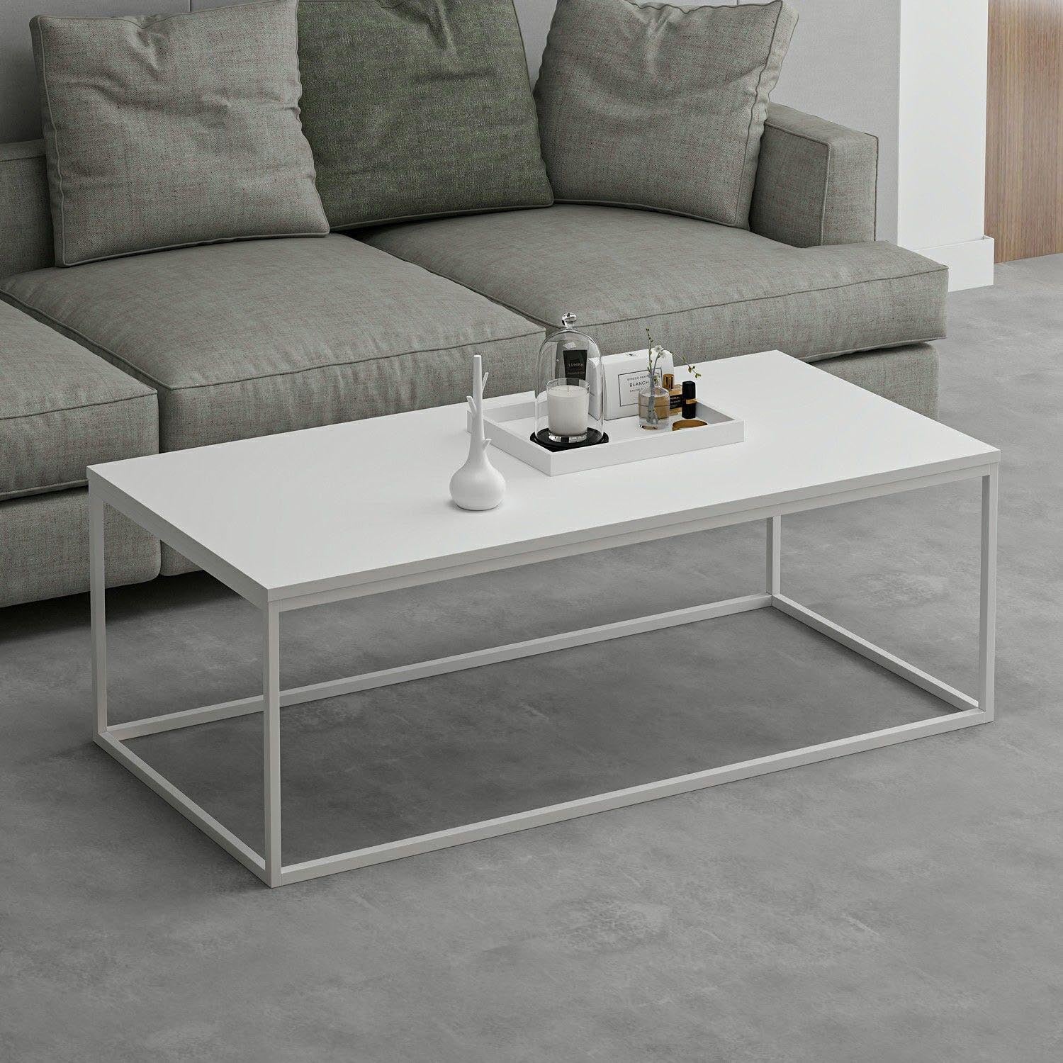 Verleihen Sie Ihrem Zuhause mit dem Tiger Sofatisch in Weiß von Hanah Home einen modernen Akzent. Stil und Funktionalität vereint!