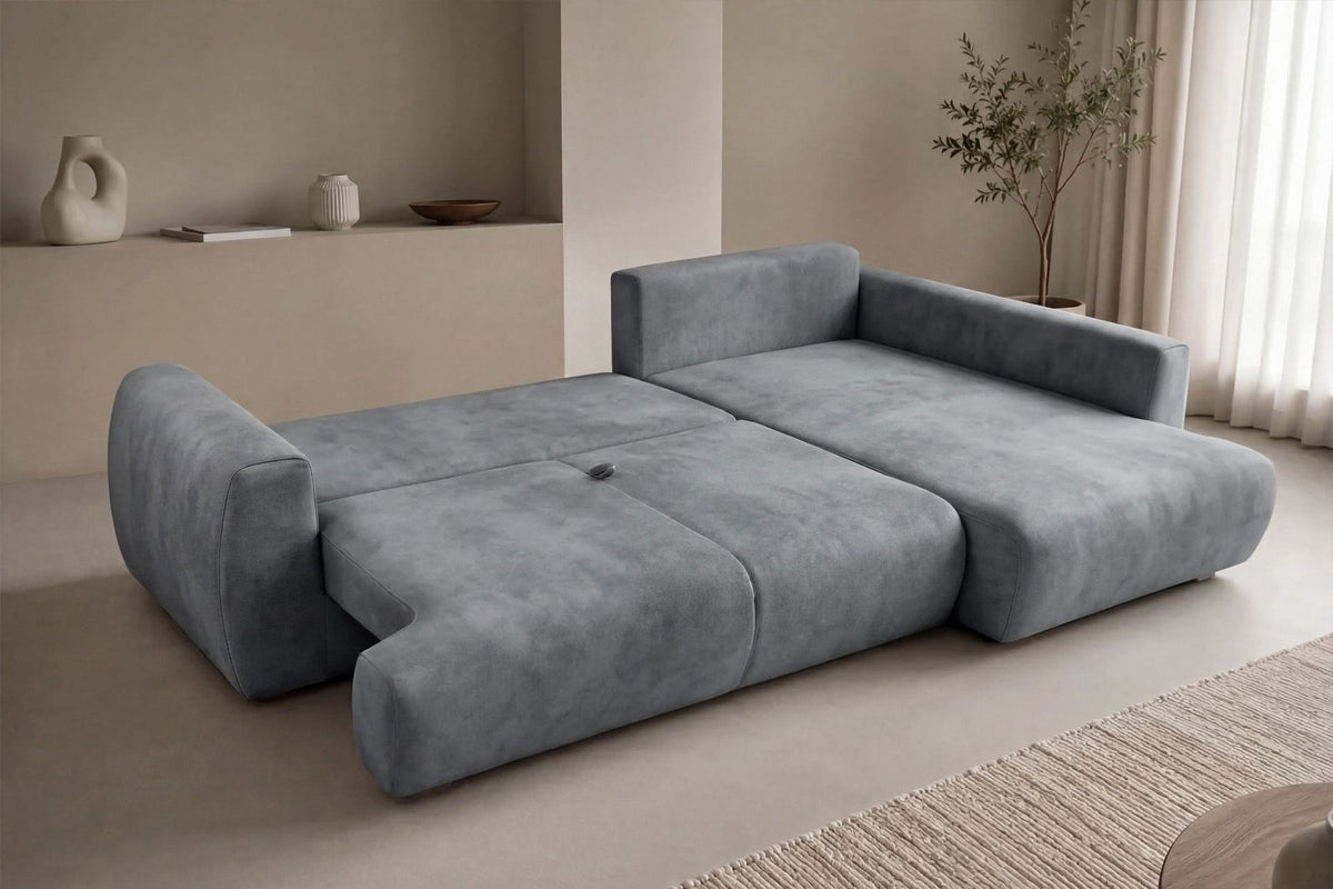 Graues Ecksofa rechts mit Schlaffunktion von Hanah Home, Bezug aus Polyester, Gestell aus Buchenholz und Spanplatte, mit zwei Kissen und Kunststoffbeinen.