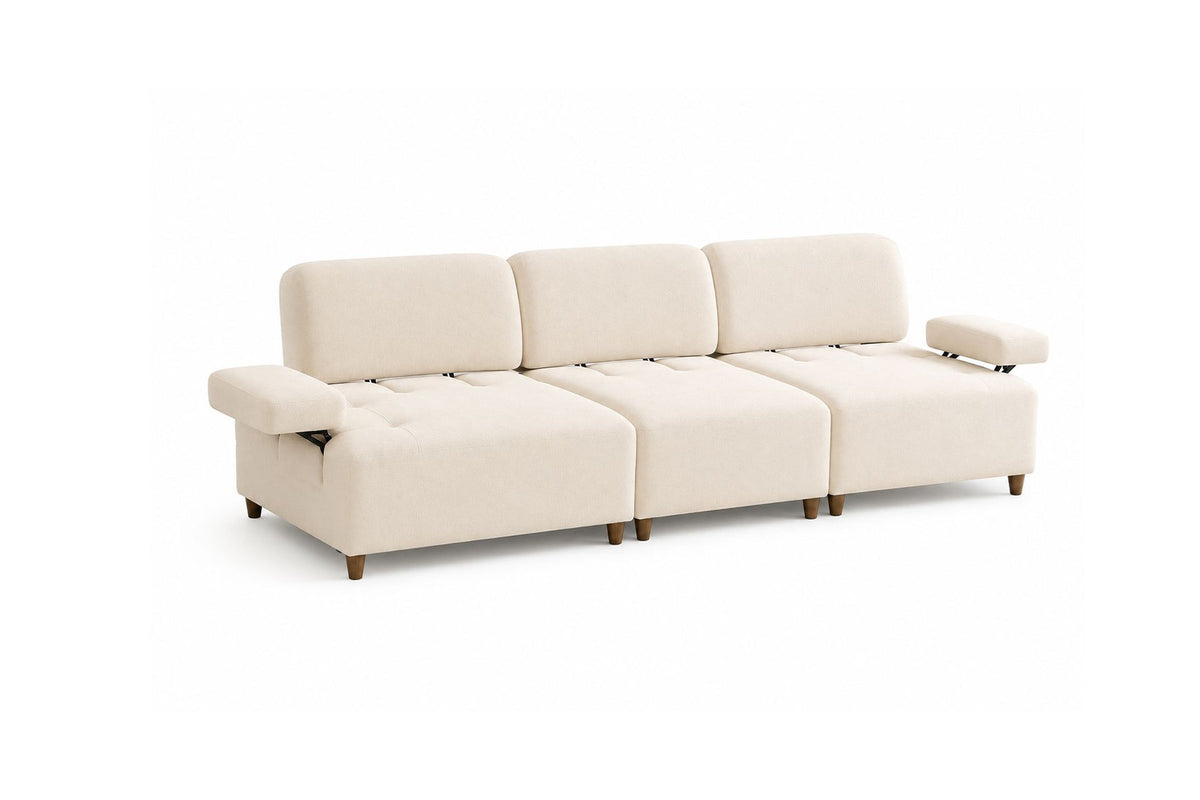 Cremefarbenes 4-Sitzer-Sofa mit hohen Kunststoffbeinen, Polyesterbezug, Buchenholzgestell und zwei losen Kissen auf hellem Hintergrund.