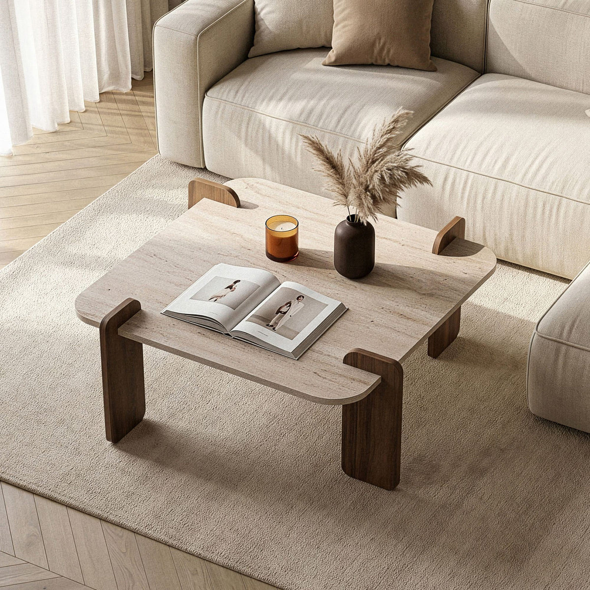 Couchtisch mit Tischplatte in Travertin-Optik und Untergestell in Venezia-Nussbaum-Optik aus melaminbeschichteter Spanplatte, 117 x 117 x 35 cm.