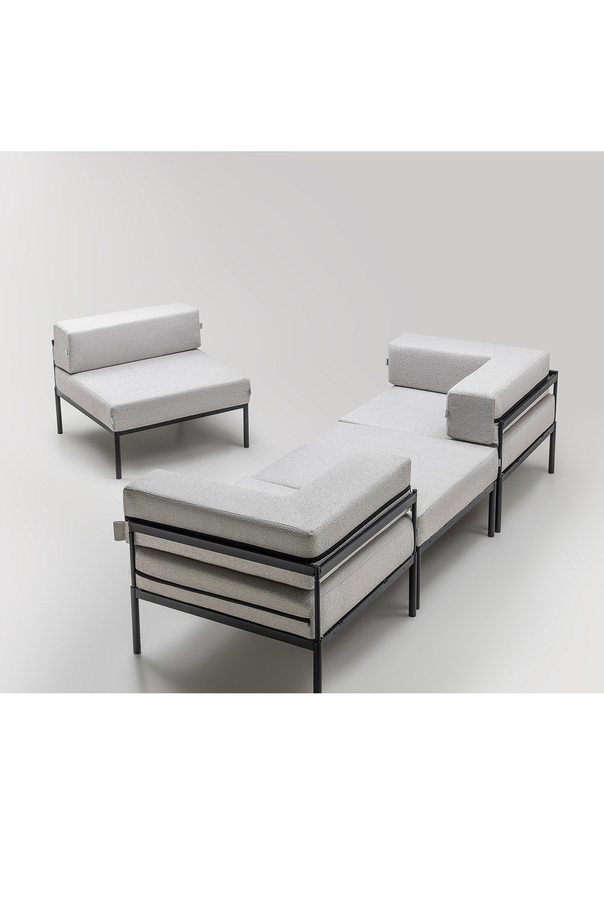 Ecksofa Corner Set 270 von Hanah Home in Schwarz und Grau, Bouclé-Stoff, Metallbeine, breite Sitzfläche und Rückenlehne.