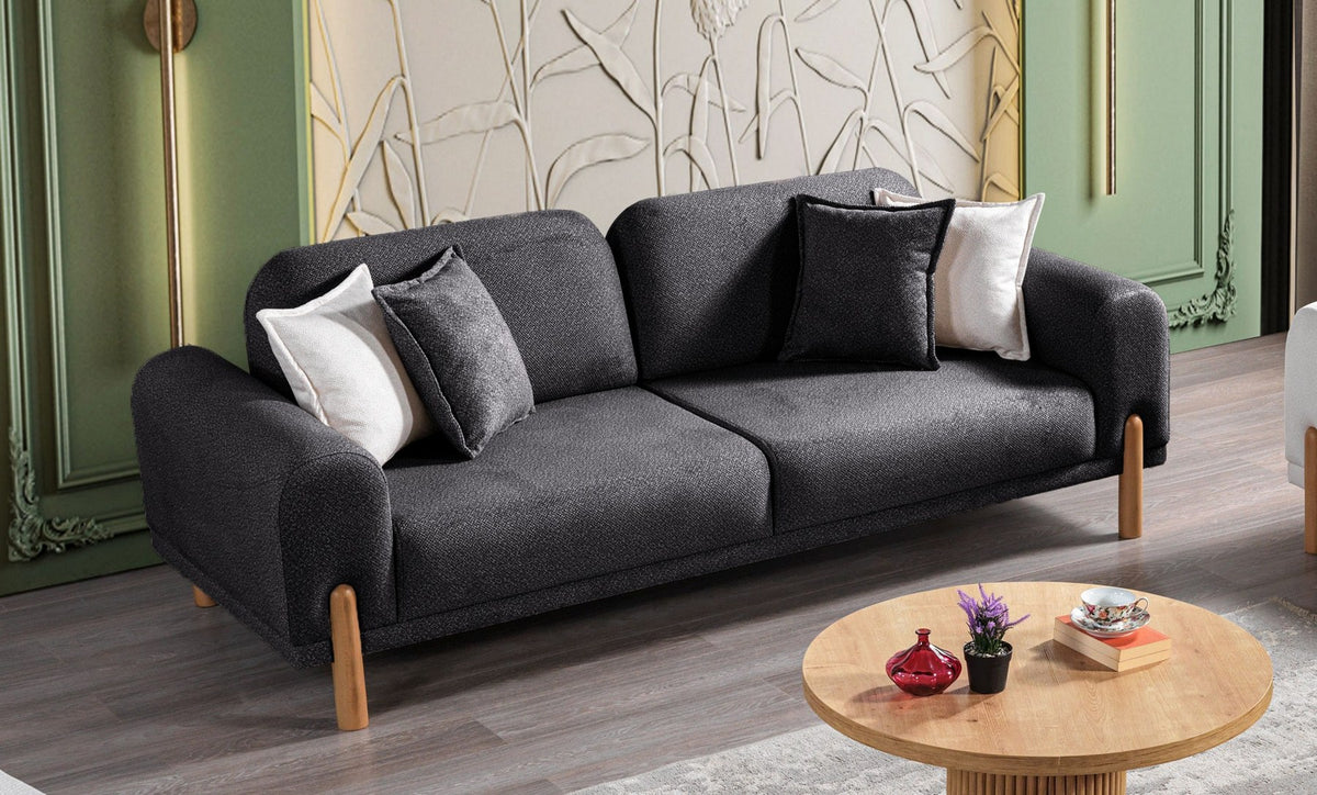Anthrazitfarbenes 3-Sitzer Schlafsofa Class Bohem von Hanah Home mit Bouclé-Bezug, Holzbeinen und verstellbaren Armlehnen.