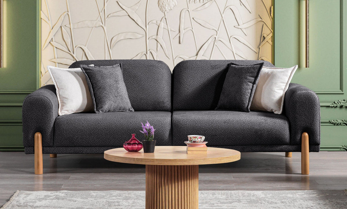 Anthrazitfarbenes 3-Sitzer Schlafsofa Class Bohem von Hanah Home mit Bouclé-Bezug, Holzbeinen und verstellbaren Armlehnen.