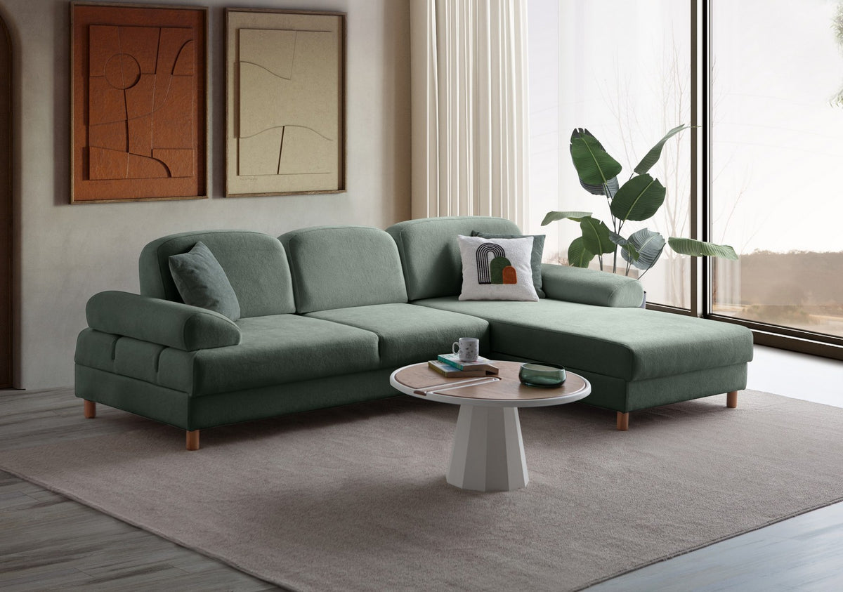 Grünes Eck-Schlafsofa Aries von Hanah Home mit Coco-Boucle-Stoff, Holzbeinen und Aufbewahrungstruhe, rechts ausgerichtet.