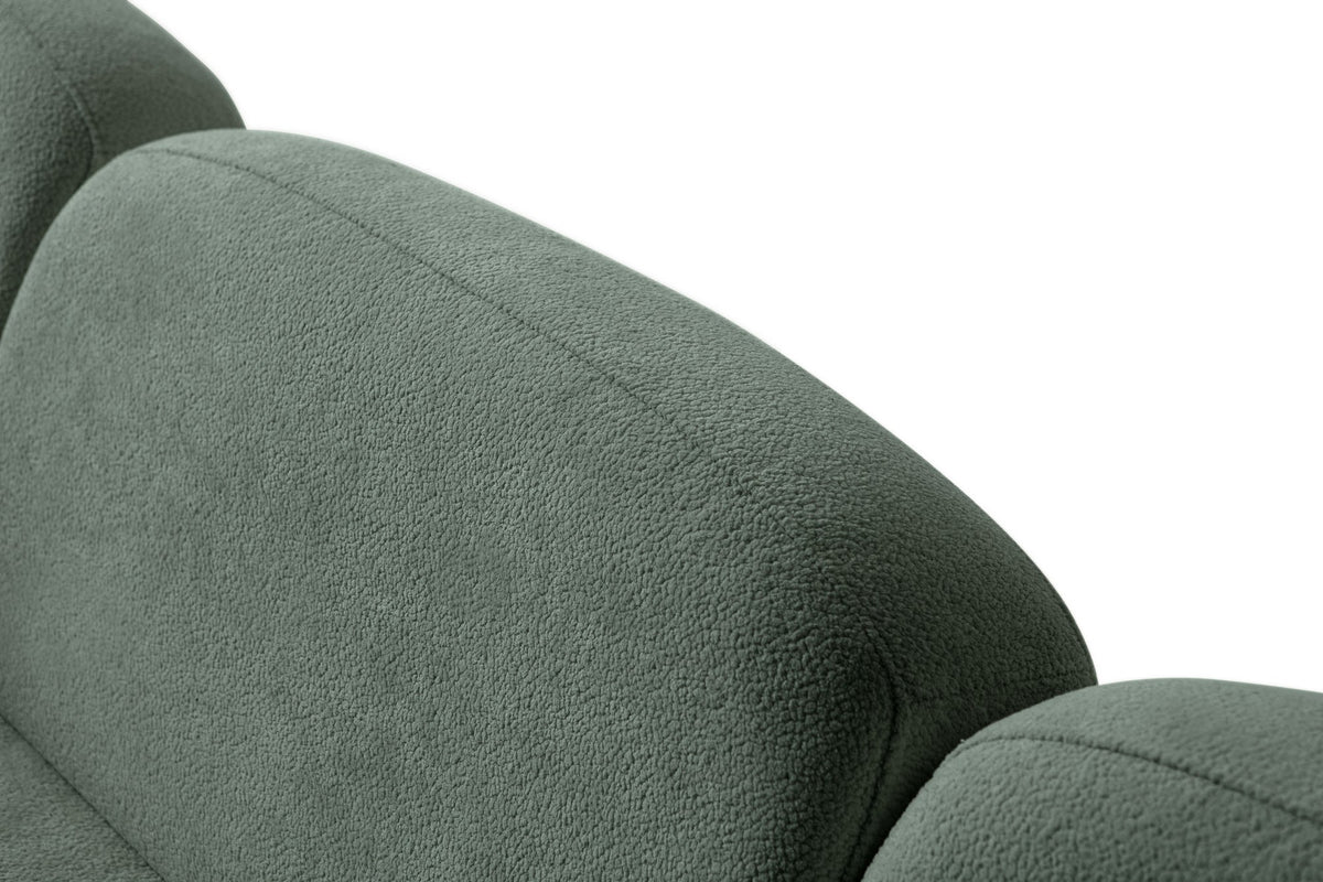 Grünes Eck-Schlafsofa Aries Modular S von Hanah Home mit Coco-Boucle-Stoffbezug, Holzbeinen und integrierter Truhe für Stauraum.