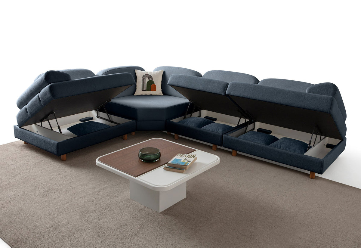 Marineblaues Eck-Schlafsofa Aries Modular M von Hanah Home mit Coco-Boucle-Stoffbezug, Holzbeinen und ausklappbarer Liegefläche.
