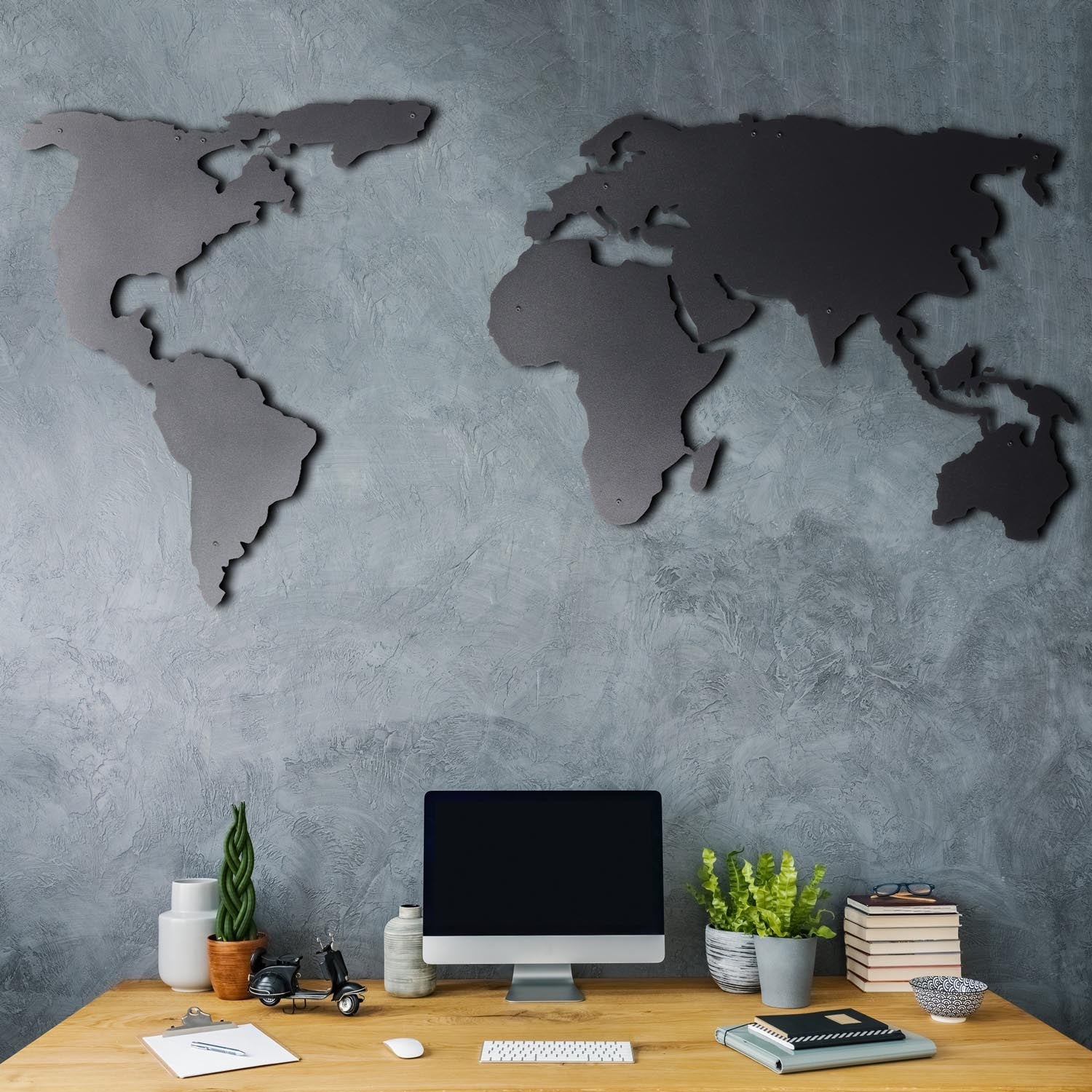 Gestalten Sie Ihre Wände neu mit der eleganten World Map Silhouette von Wallity. Diese stilvolle Metall-Wanddeko in Schwarz bringt zeitlose Raffinesse in jeden Raum.