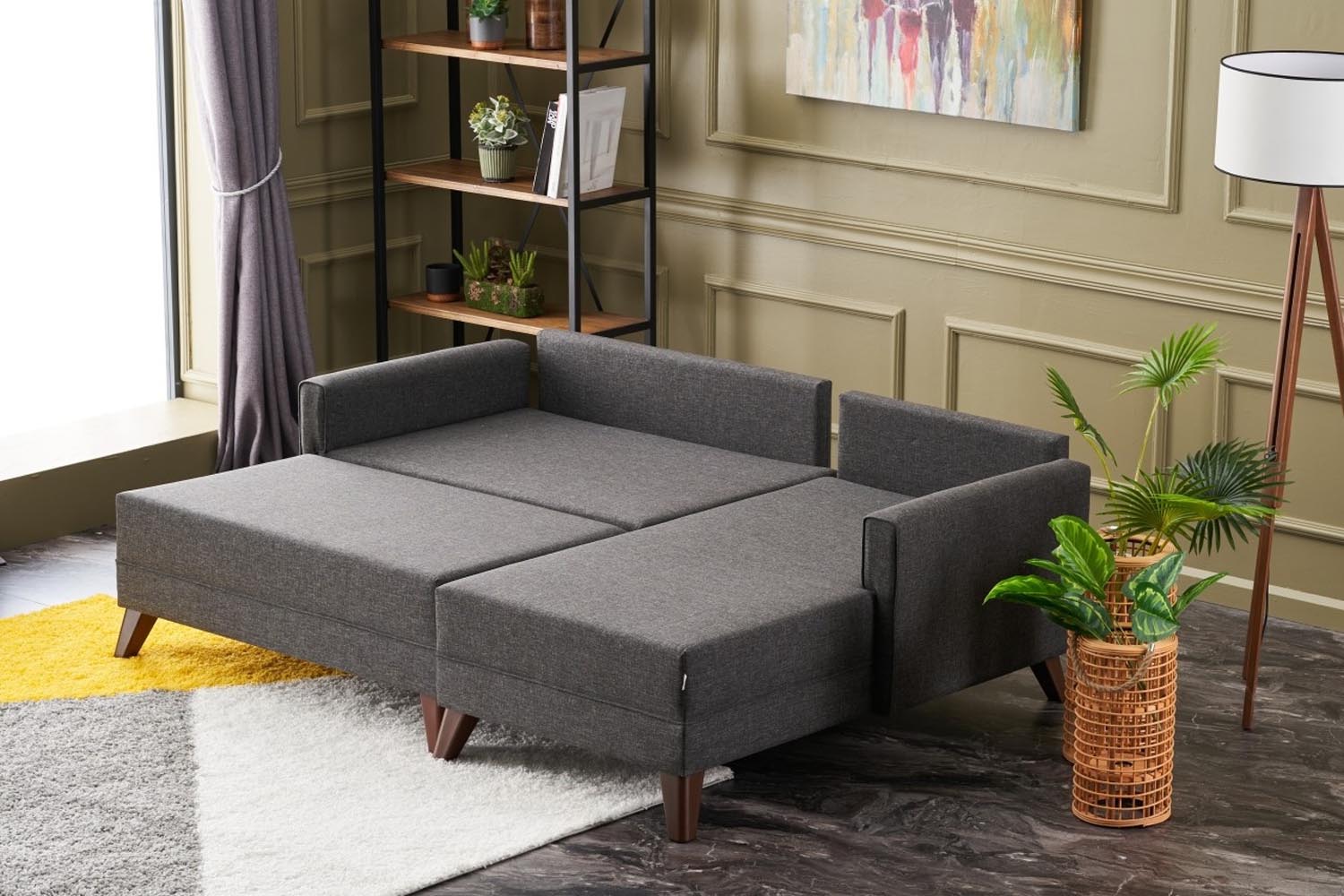 Entdecken Sie das Bella Mini Ecksofa Bett in stilvollem Anthrazit von Atelier Del Sofa. Ideal für entspannte Abende und als Gästebett!