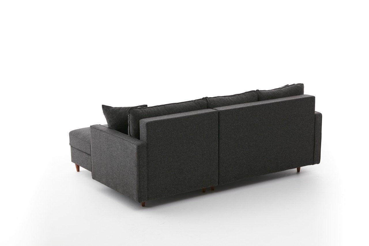 Genießen Sie das elegante Eva Right Ecksofa in Anthrazit – ideal für stilvolle Entspannung und ein modernes Wohnambiente.
