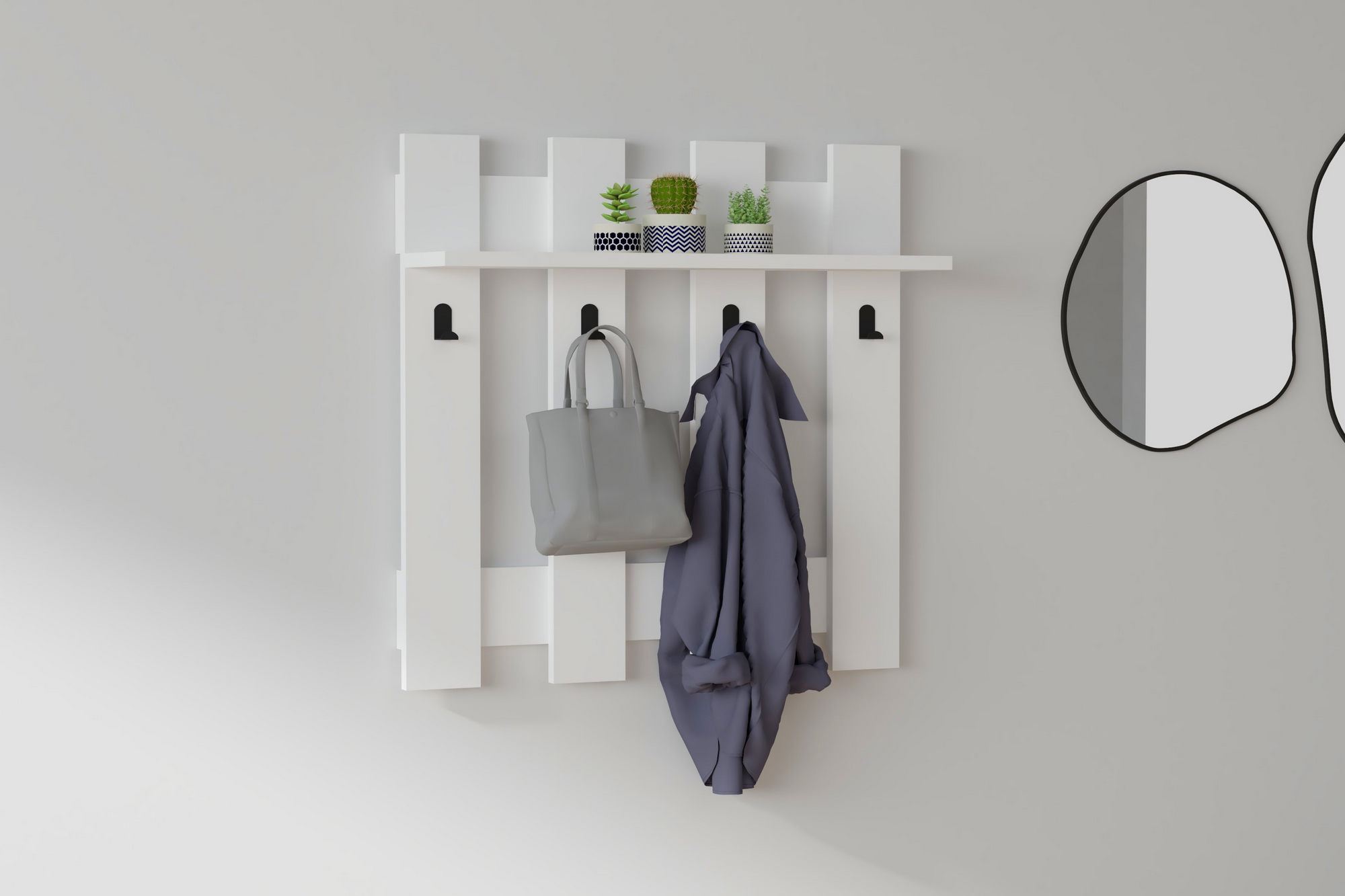 Entdecken Sie den eleganten Carina Kleiderhaken in Weiß von Hanah Home. Ideal für stilvolle Organisation in jedem Raum!