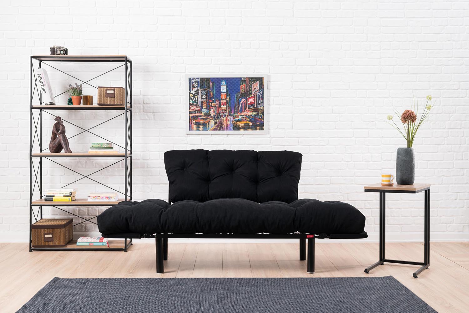 Erleben Sie das Nitta Bettsofa in stilvollem Schwarz von Atelier Del Sofa – ein elegantes, vielseitiges Möbelstück, das Komfort und Langlebigkeit vereint.
