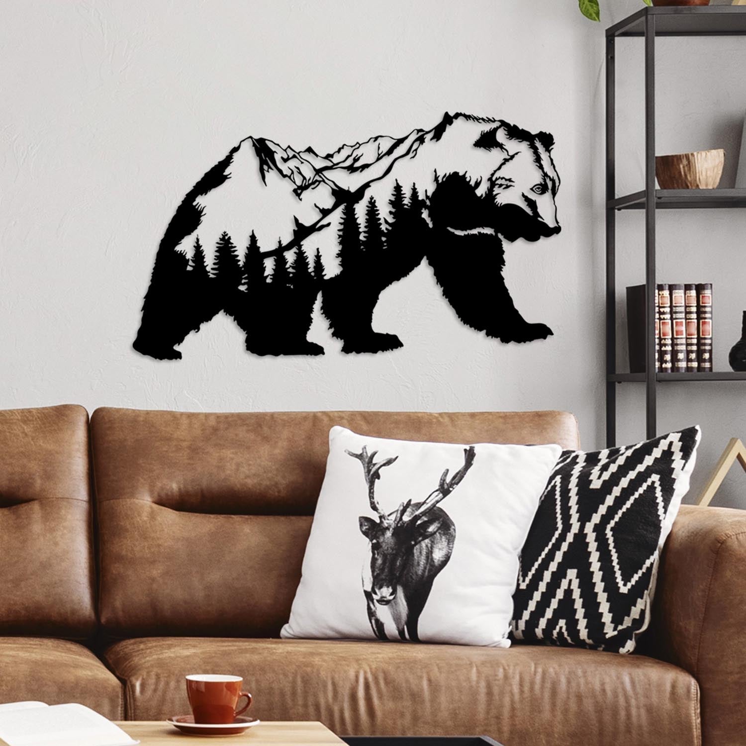 Verleihen Sie Ihrem Zuhause mit der Orso Wanddeko von Wallity in Schwarz einen modernen Akzent. Dieses hochwertige Metallstück ist ein echter Blickfang!