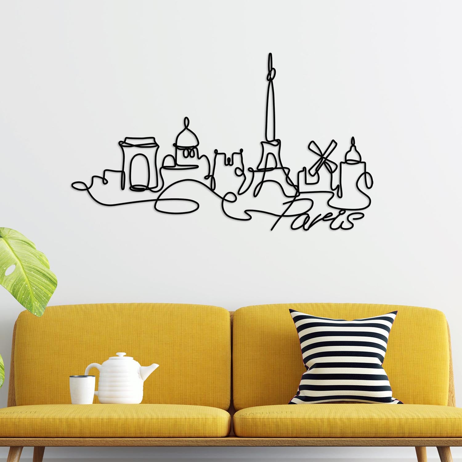 Schwarz glänzende Paris Wanddeko von Wallity – ein modernes Metallkunstwerk, das Eleganz und Stil in Ihr Zuhause bringt.