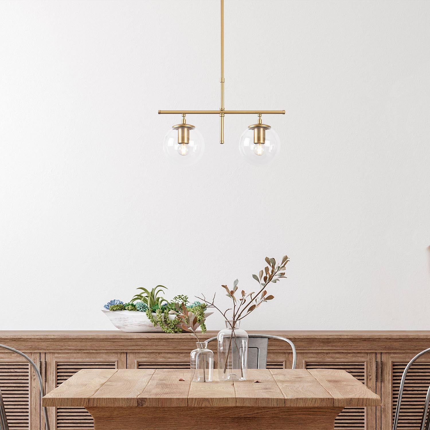 Verleihen Sie Ihrem Raum mit der Roe Pendelleuchte in glänzendem Gold von Opviq einen Hauch von Luxus und zeitloser Eleganz.