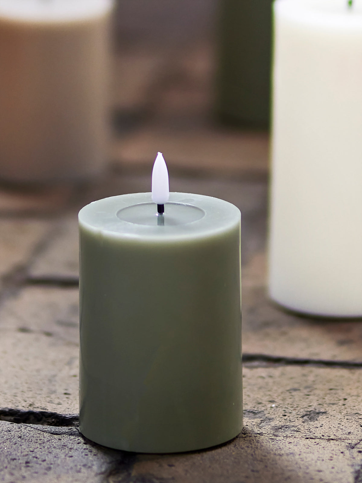 Ponza LED-Kerze, Grün, Paraffine in Green präsentiert im Onlineshop von KAQTU Design AG. Kerzen ist von Bloomingville