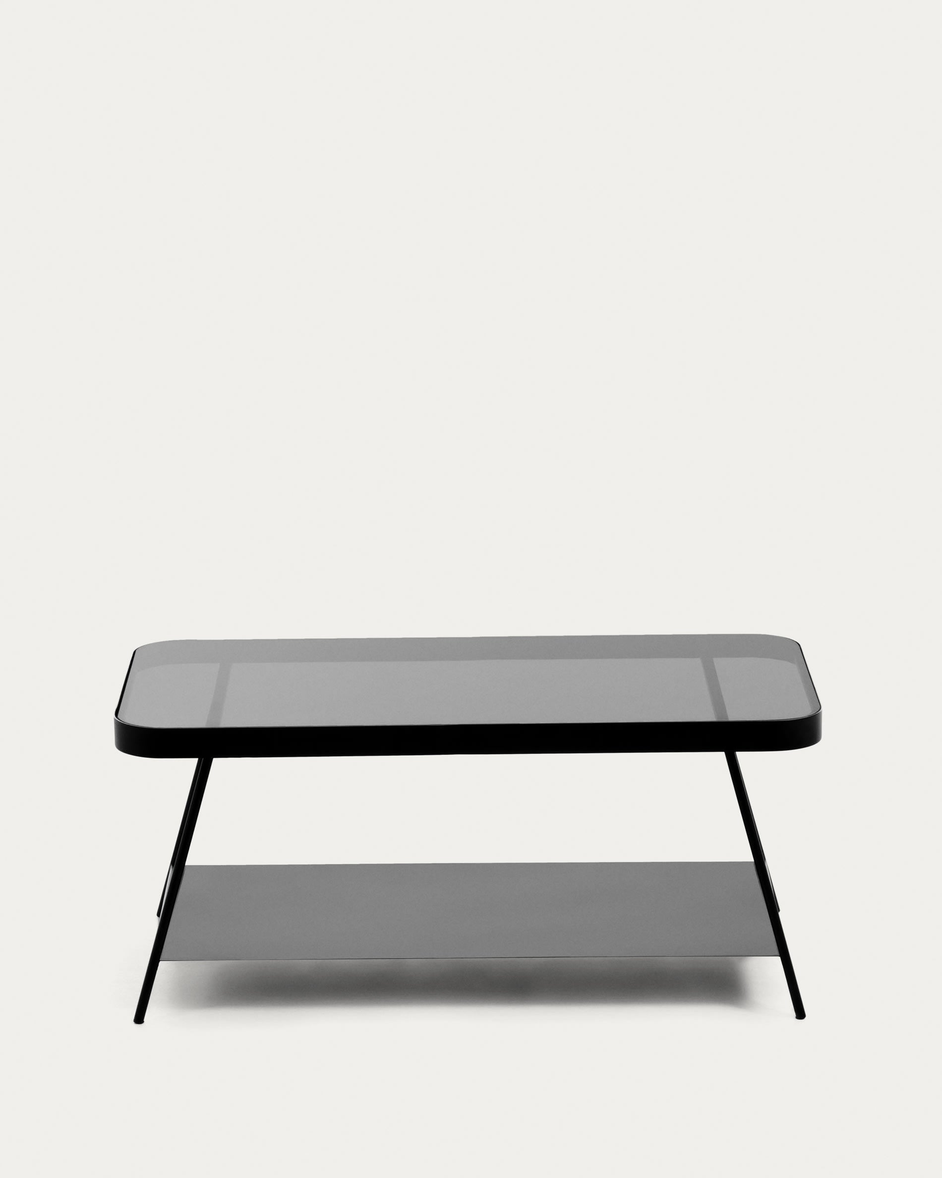 Eleganter Couchtisch mit rauchgrauer Glasplatte und schwarzem Stahlrahmen, 90x45 cm, perfekt für moderne Wohnräume.