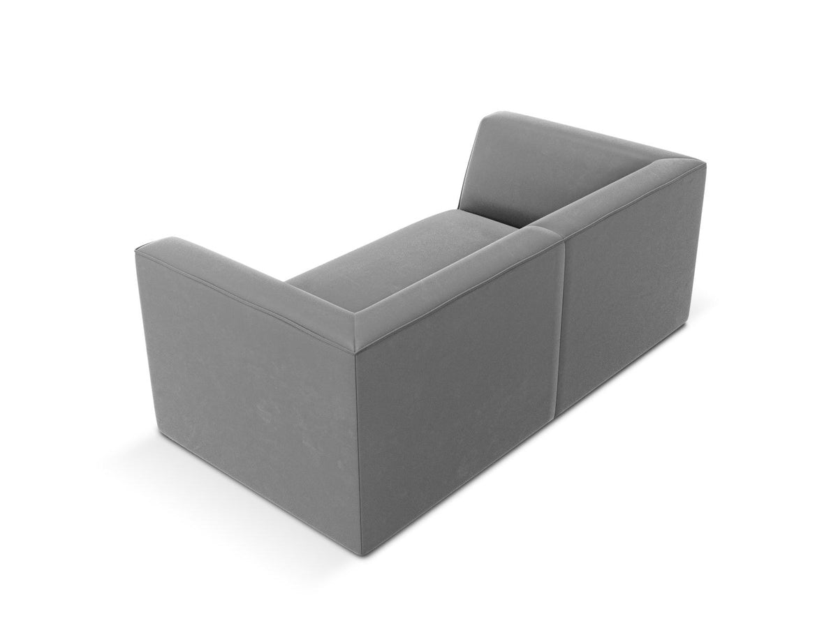 Zweisitzer-Sofa Siena in Beige-Salvador-Samt mit schwarzen Kunststoffbeinen, gepolsterter Sitzfläche und niedriger Rückenlehne, Frontansicht.