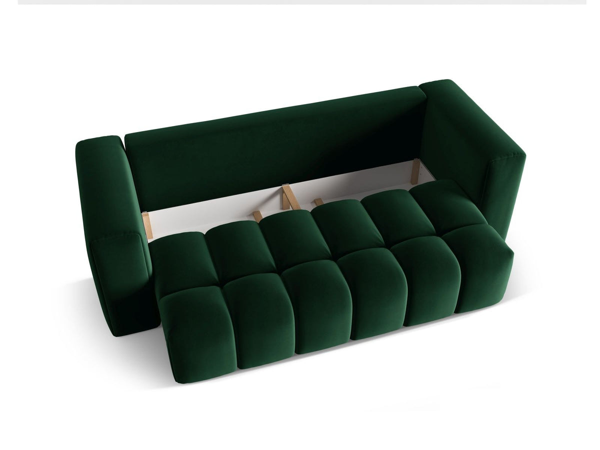 Sandfarbenes Samt-Bettsofa Verona mit drei Sitzplätzen, ausklappbarer Liegefläche, Bettkasten und schwarzen Kunststoffbeinen im Wohnraum.
