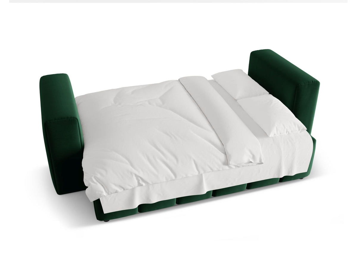 Sandfarbenes Samt-Bettsofa Verona mit drei Sitzplätzen, ausklappbarer Liegefläche, Bettkasten und schwarzen Kunststoffbeinen im Wohnraum.